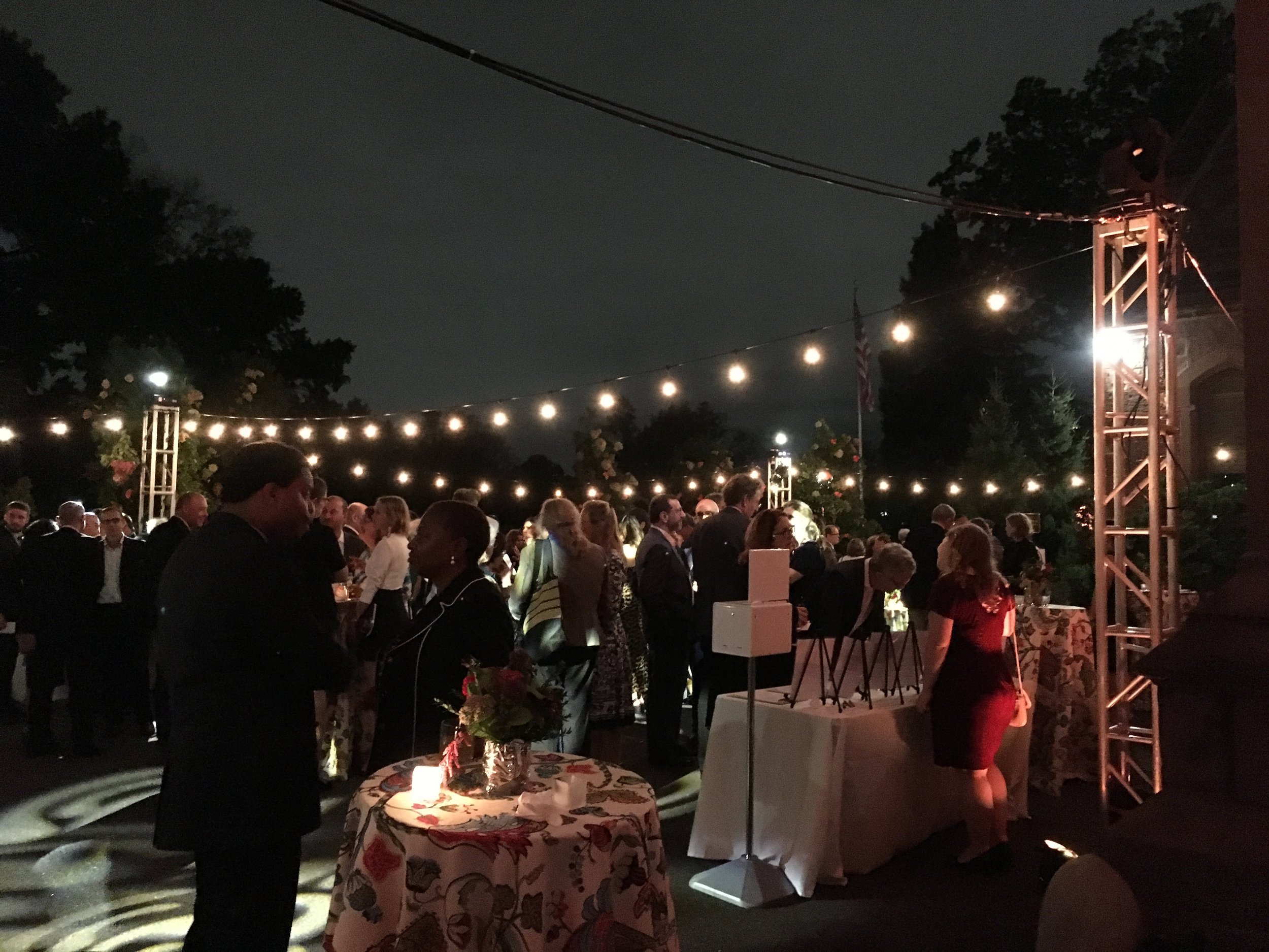 Bistro lighting and moving gobos for an outdoor cocktail event