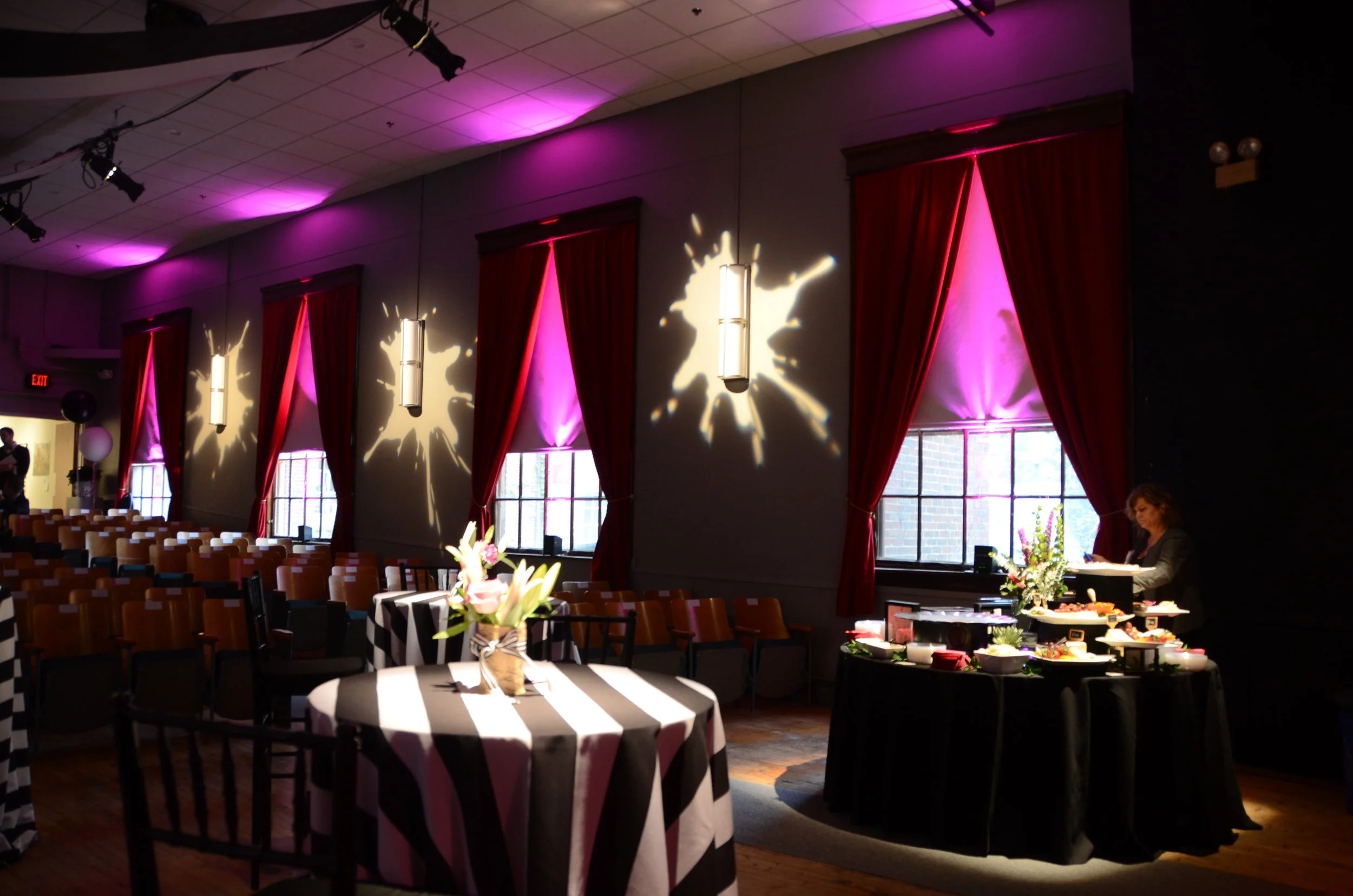 Pinspots and custom gobos to match the theme of a fundraiser