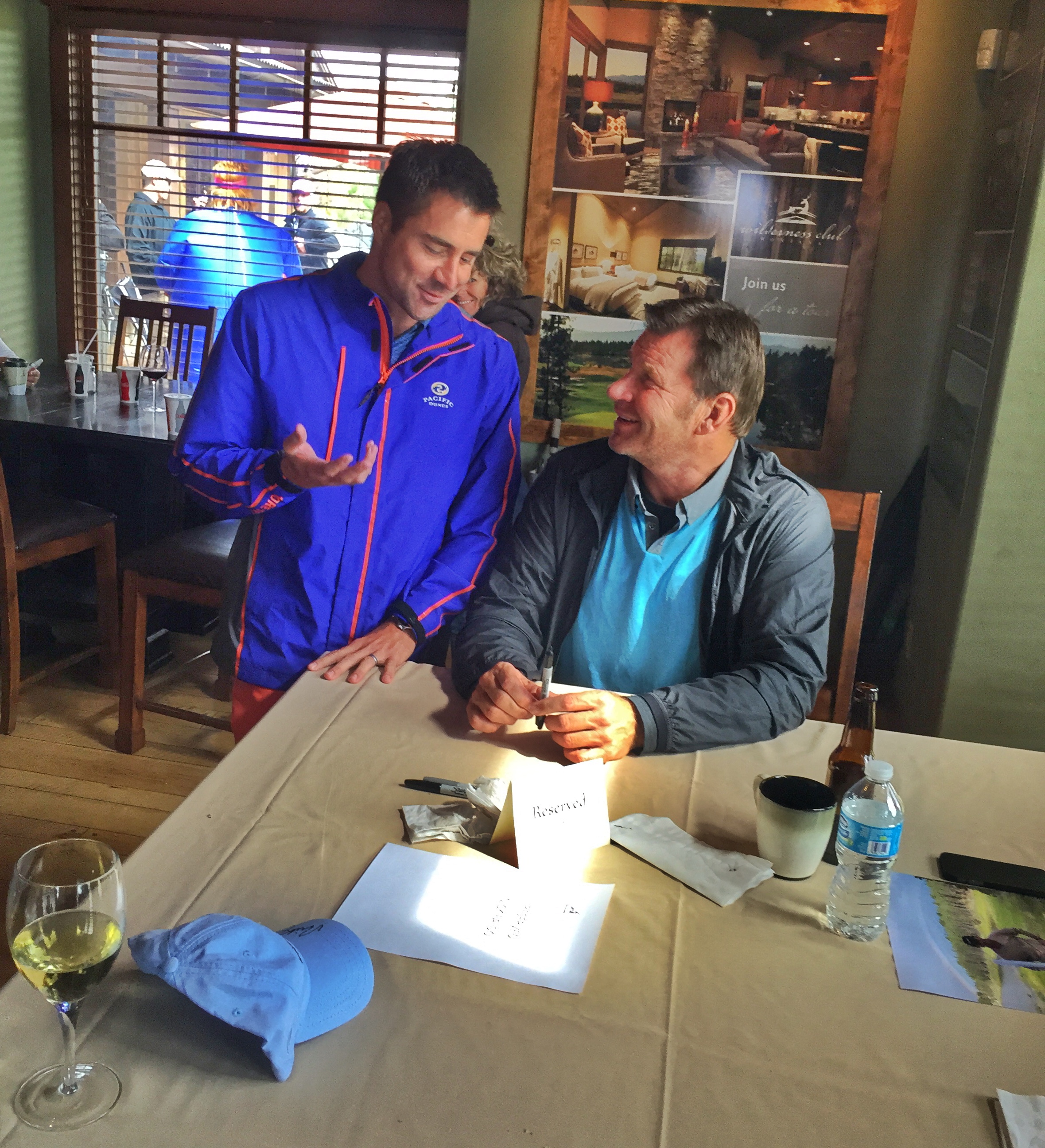 I tell hilarious golf jokes, Nick Faldo laughs with appreciation. Photo by Sarah Moodie