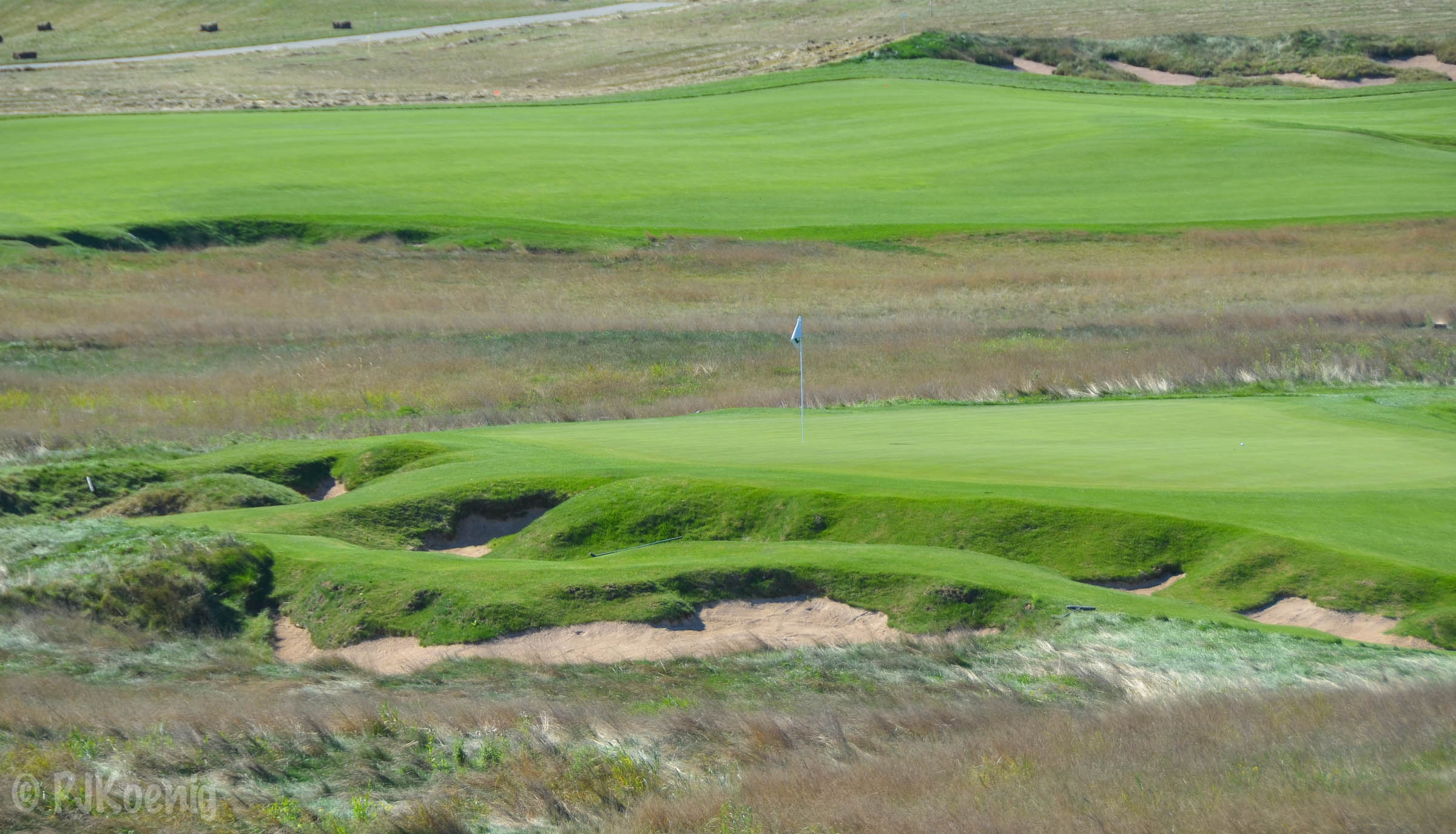 The very cool par 3, 9th hole at Erin Hills.