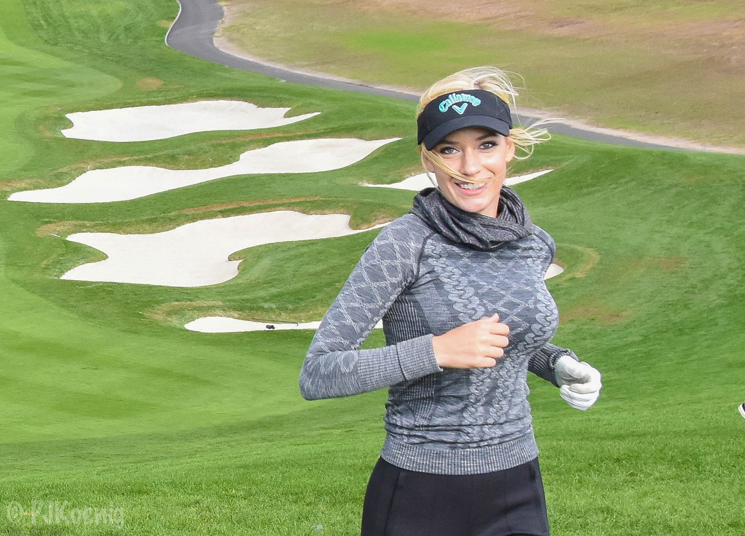 Paige climbs the hill on #6 with a smile. She would go on to make an easy birdie after almost reaching the green.in 2.