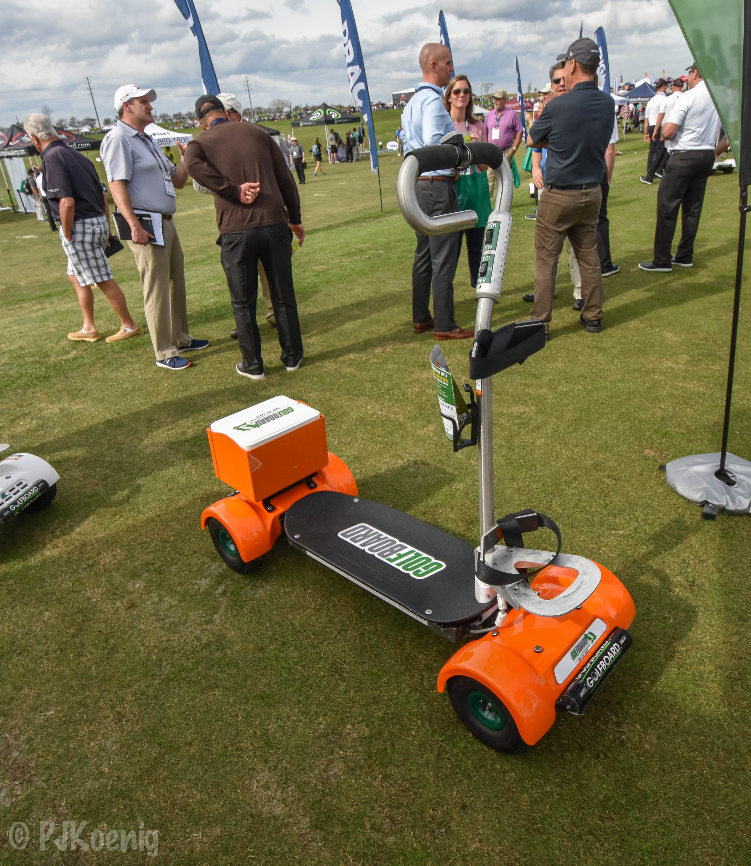 The Golf Board comes in orange! ...and has a cooler for those who are interested in drinking and boarding.