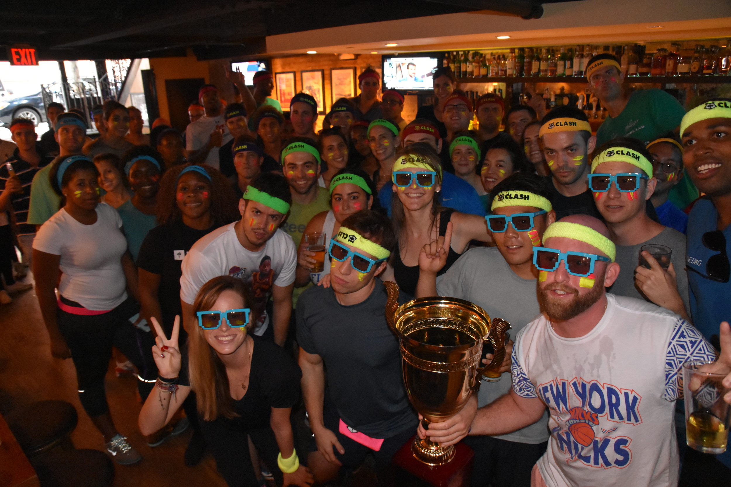 The champs pose with the legendary "Clash Cup"