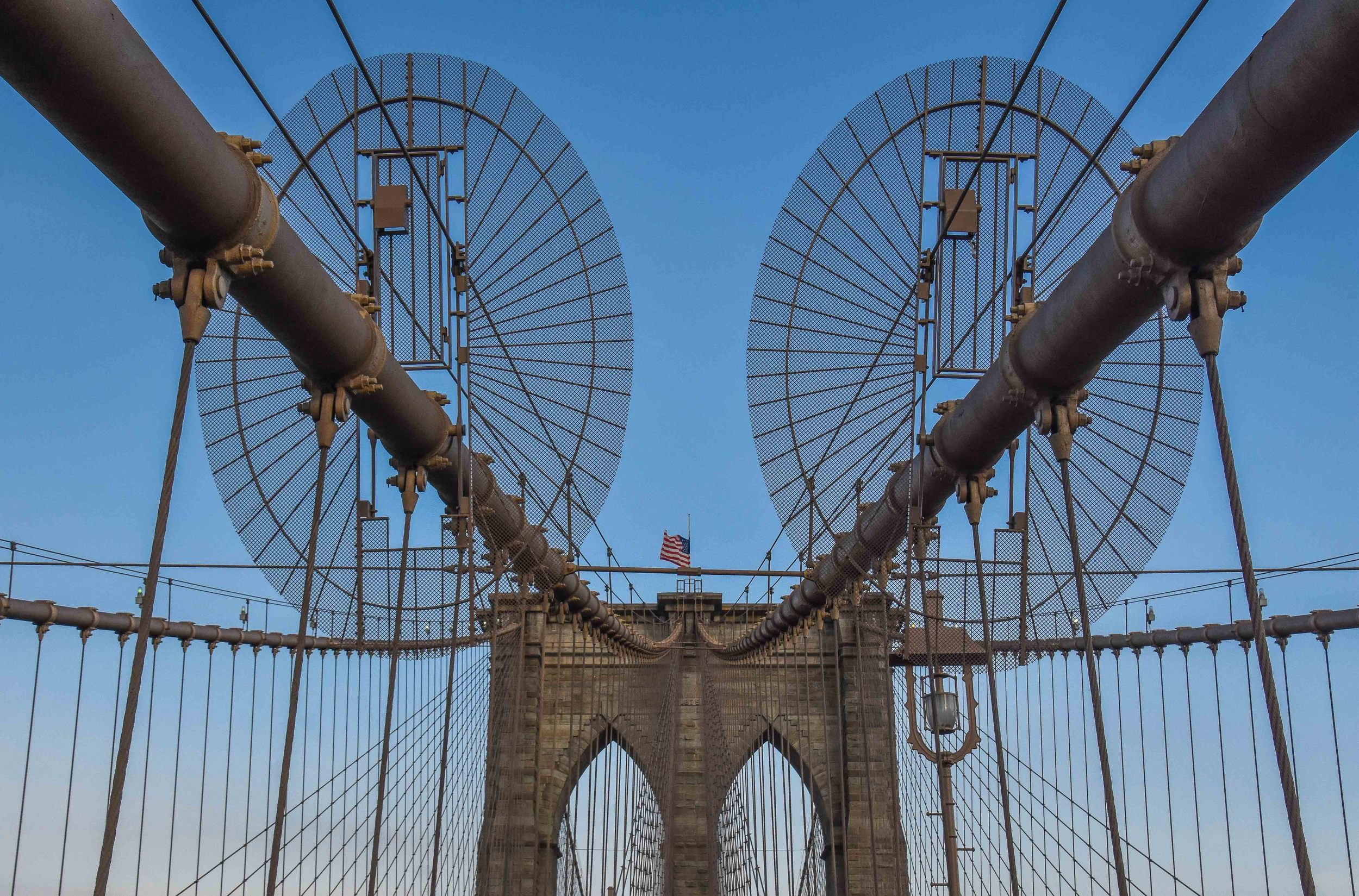 The bridge to Brooklyn. More commonly know as the Brooklyn Bridge.