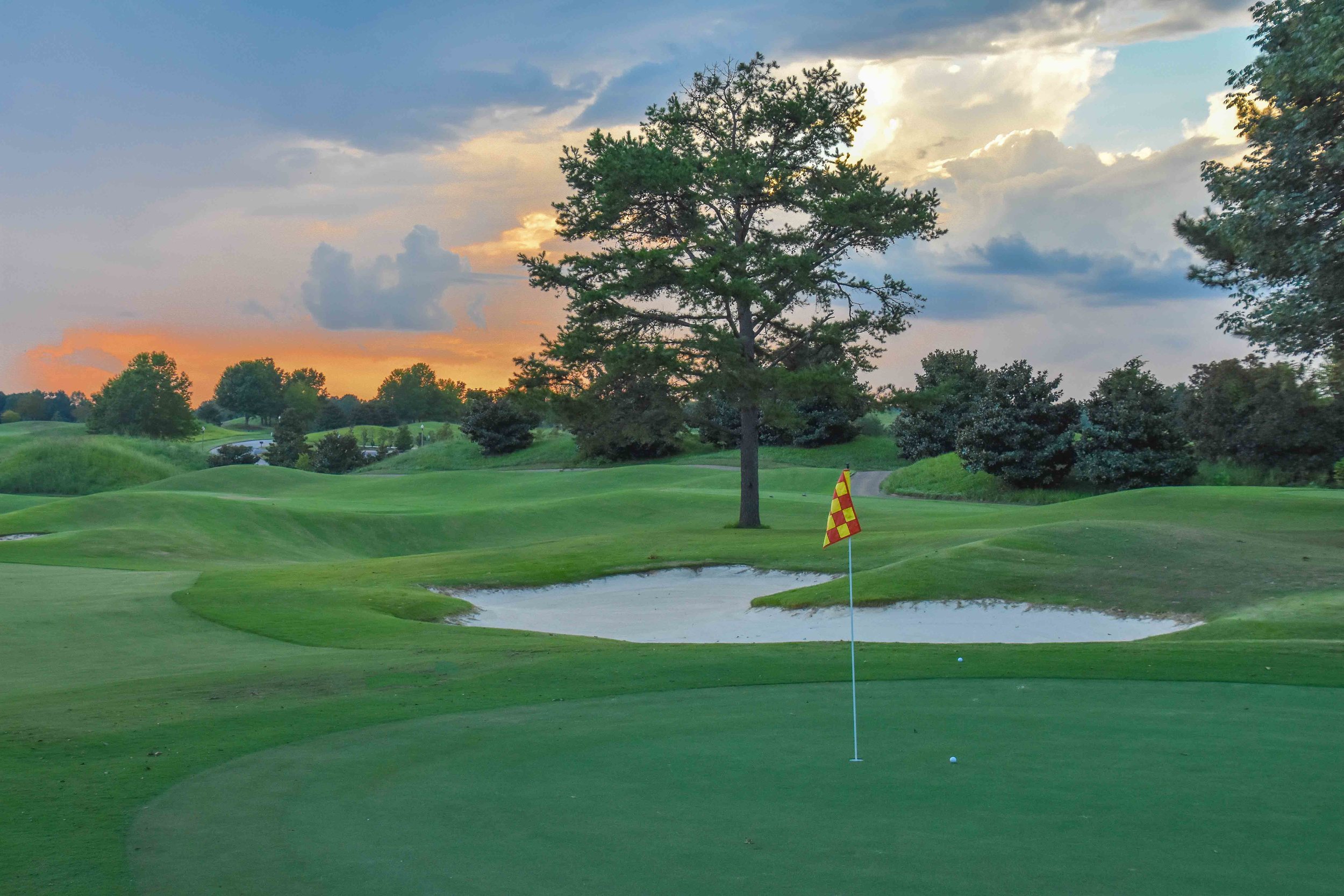 The final putt on the 45th hole of the day would fall as the sun would set on The Legislator .