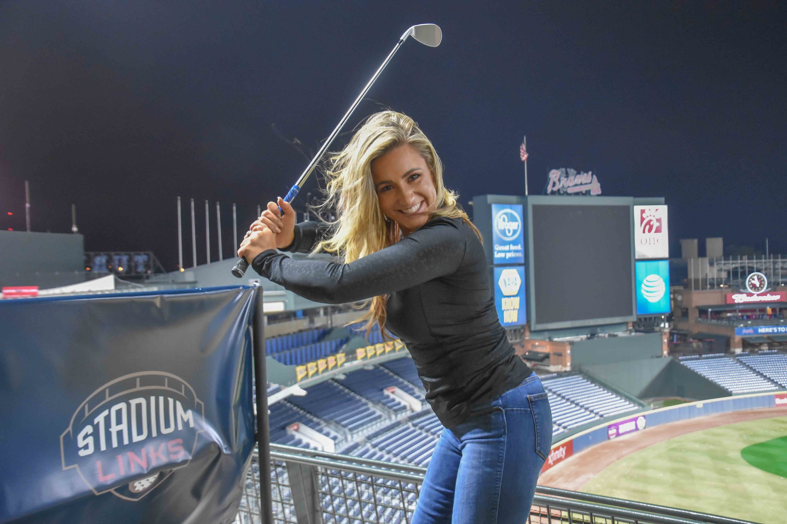 Chelsea Pezzola mixes up baseball and golf, in the classic basegolf pose.