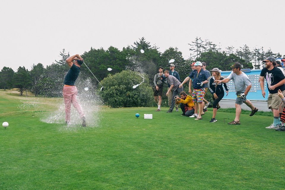 Behind the scenes action shots taken by Andrew Herrold . Even though I was soaked on the 1st tee, my pants dried quickly and the rest of the round was a blast.