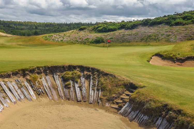 Personally, I am a big fan of railroad ties in bunkers.