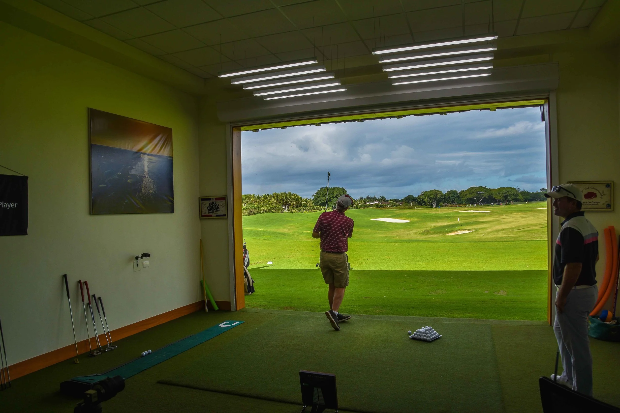 The view from inside the teaching bay. Eric is on the far right getting ready to dispense some serious golf knowledge.