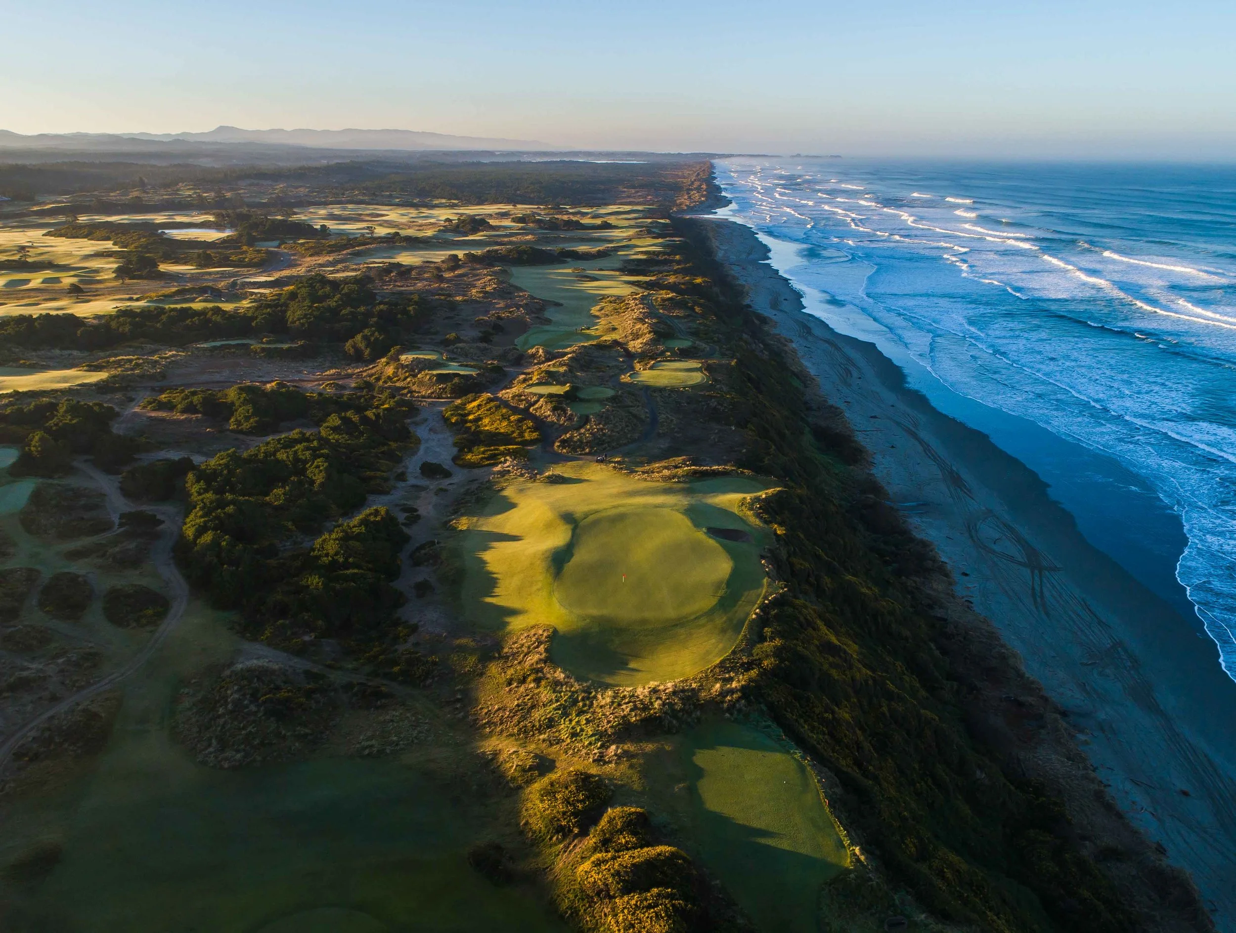 The par 3 6th hole as the sun rises.