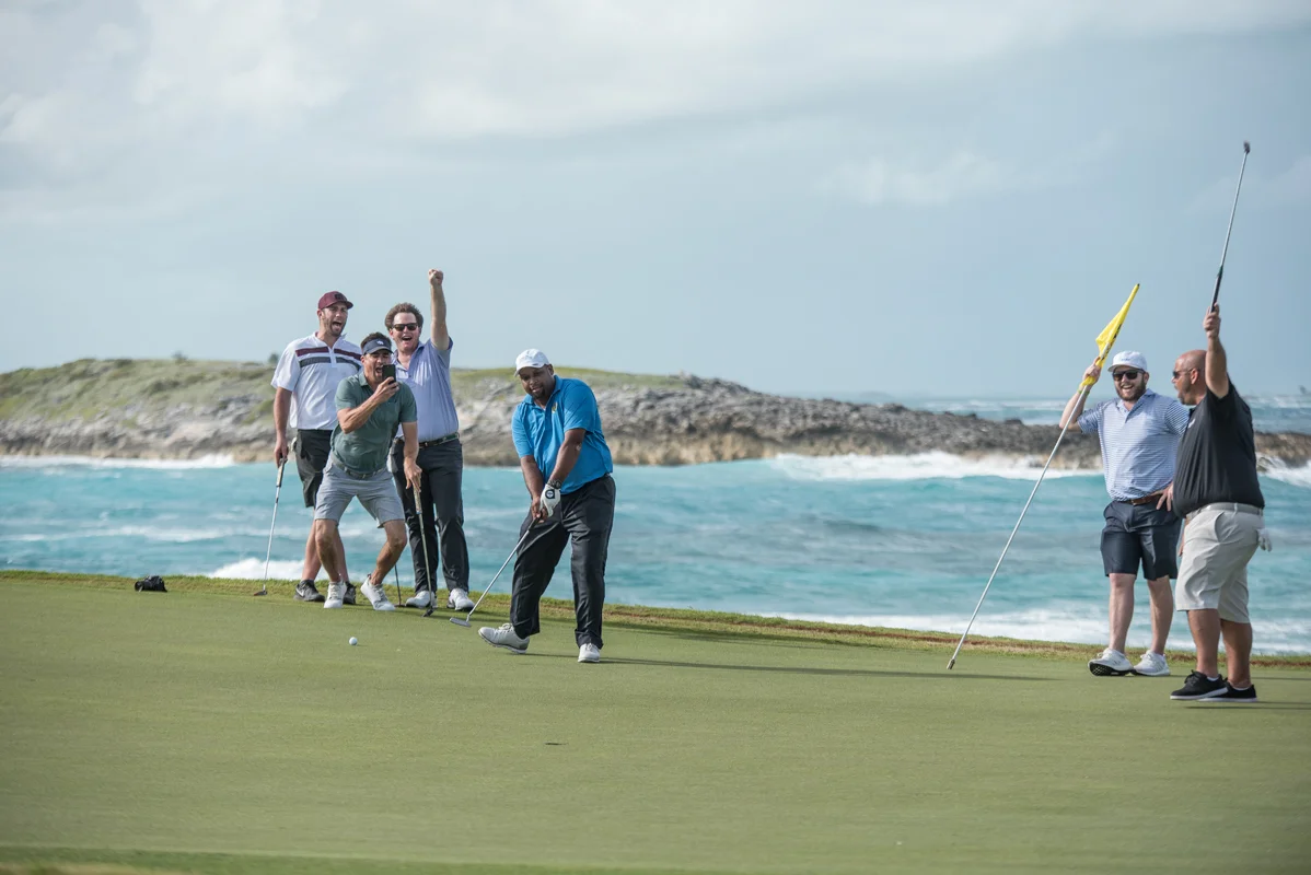 Emotions run high as another putt finds the bottom of the cup.