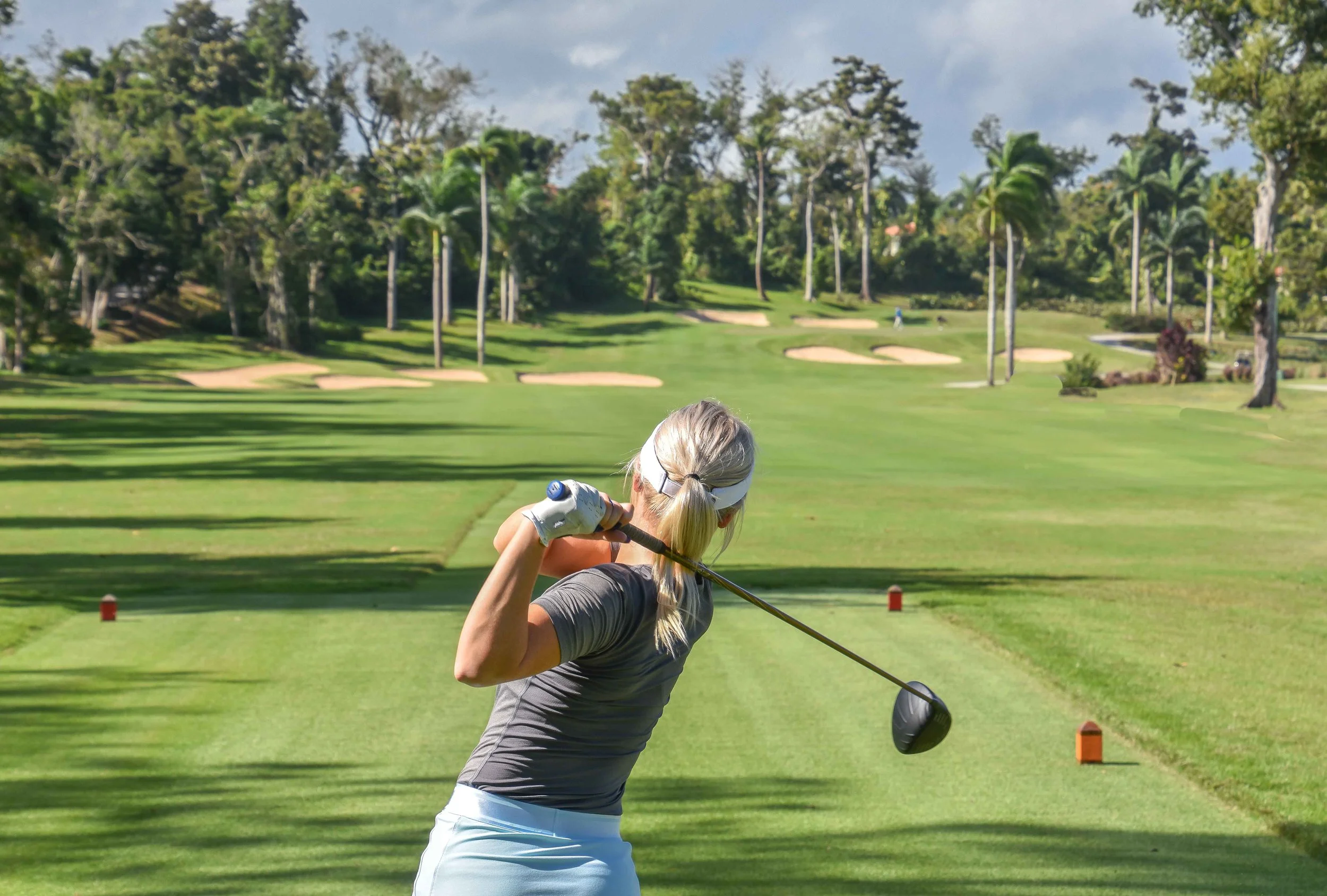 Hailey pounds her drive on the 5th hole at TPC Dorado.