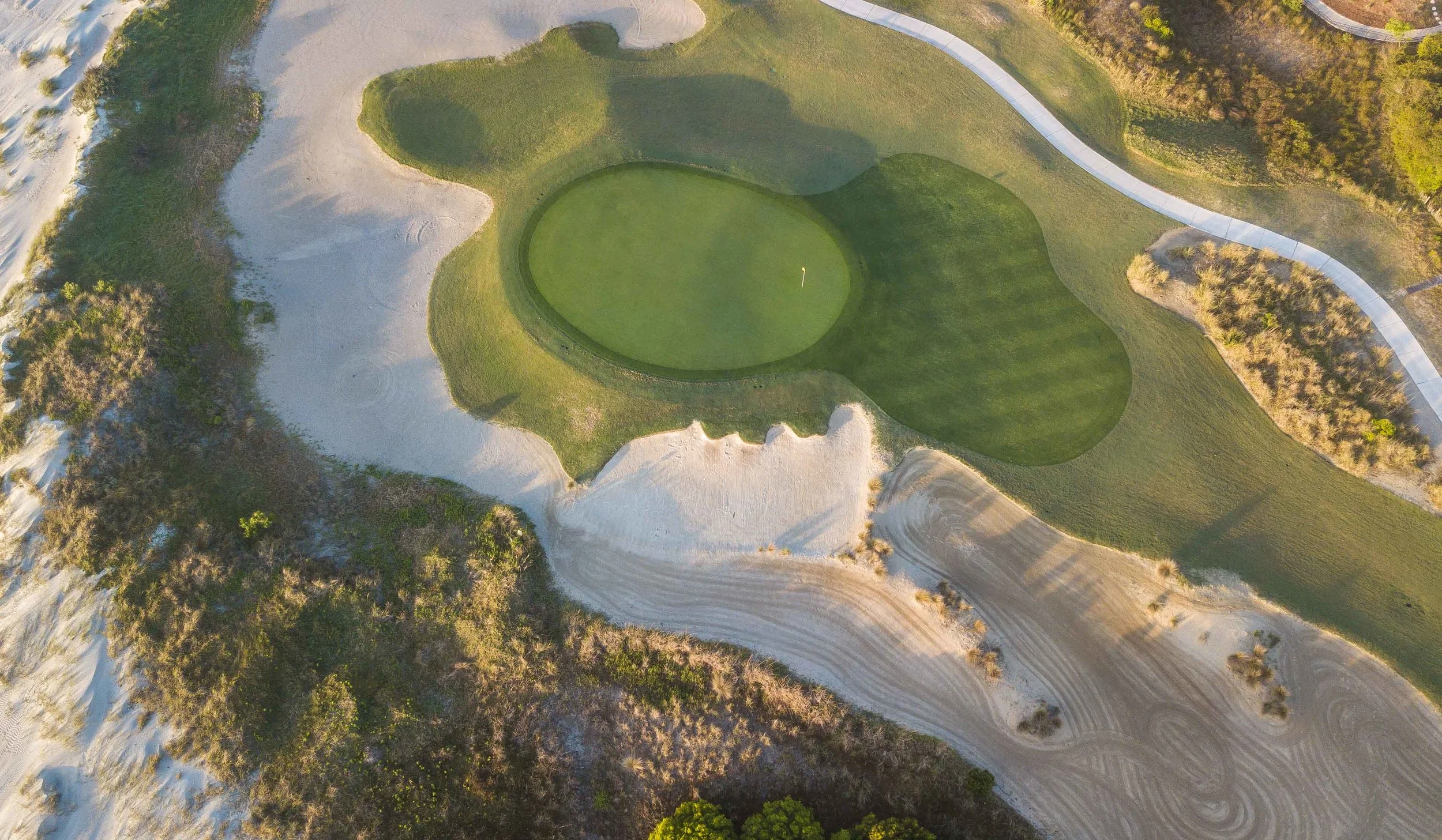The temporary par 3 18th plays at around 190 from the back tees.