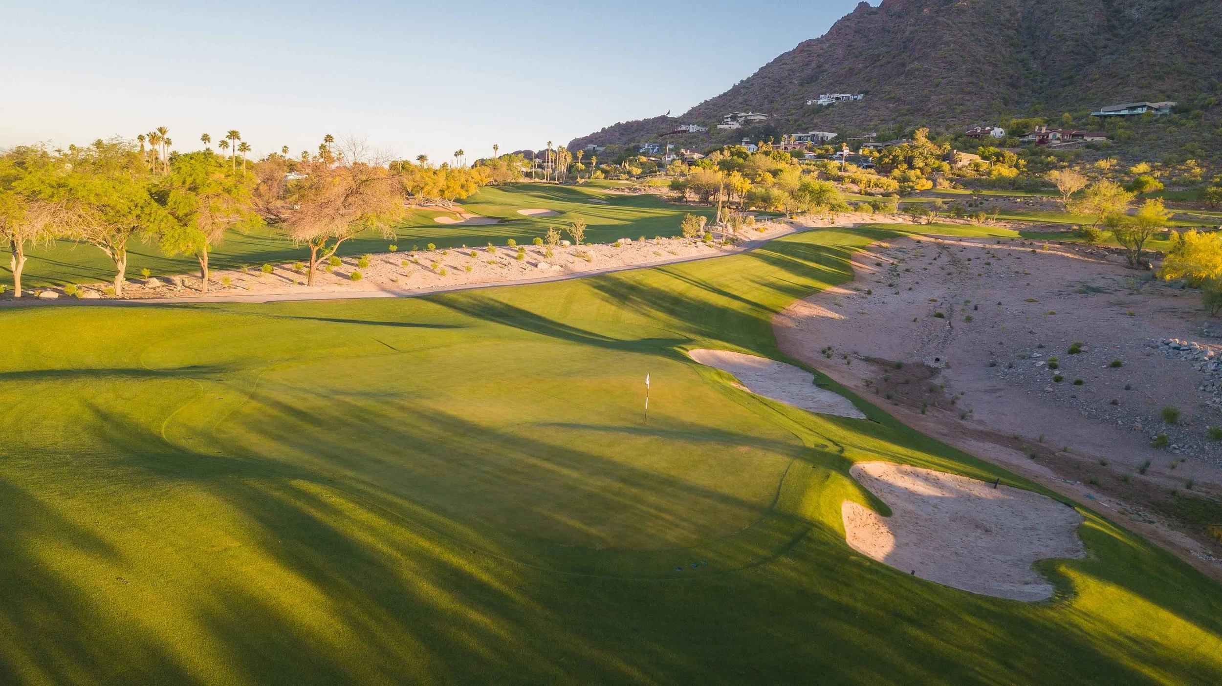 Sun rises over The Phoenician’s 11th hole.