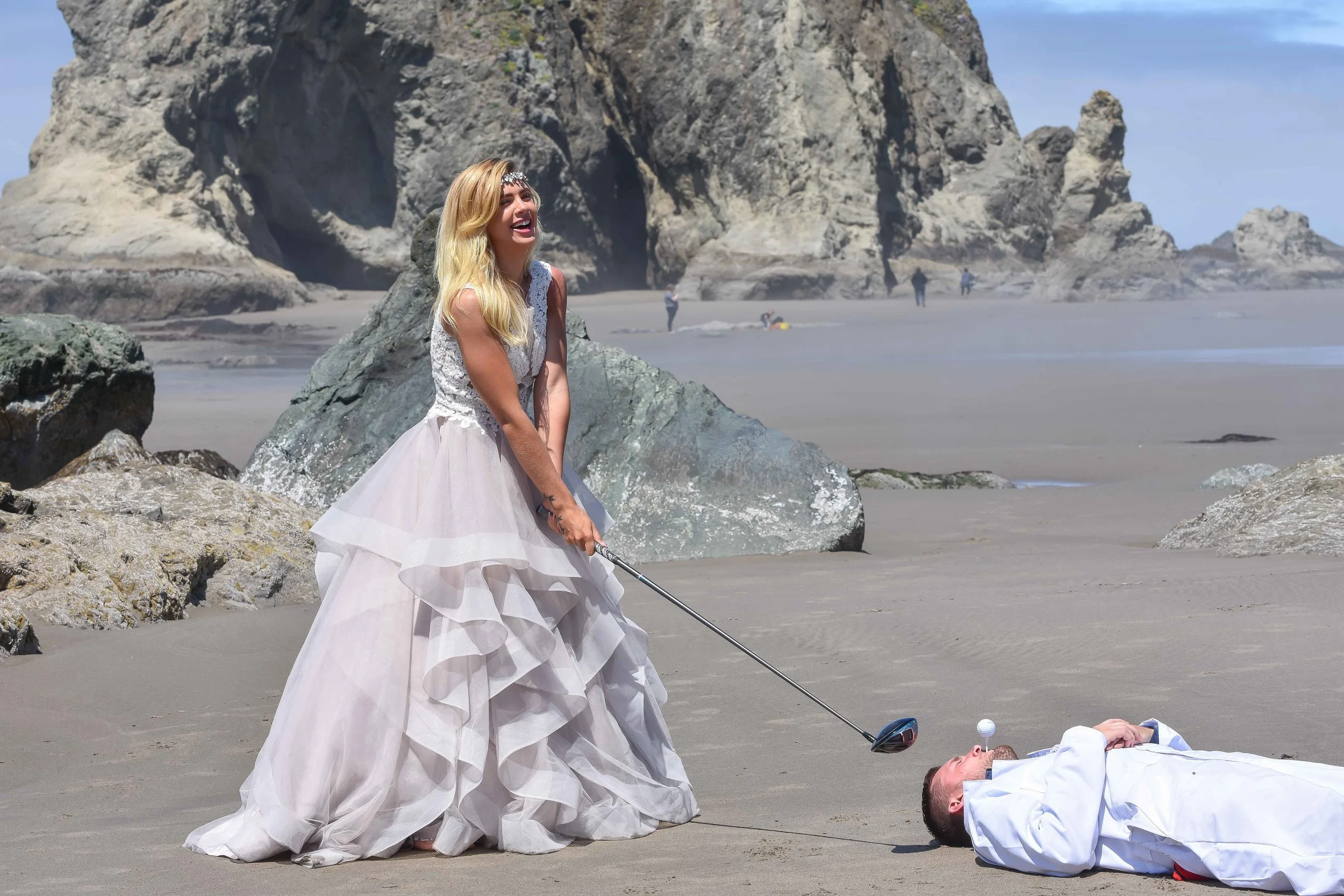Kenzie did not actually hit this golf ball off of her brother’s face. Golfing in a wedding dress is hard.