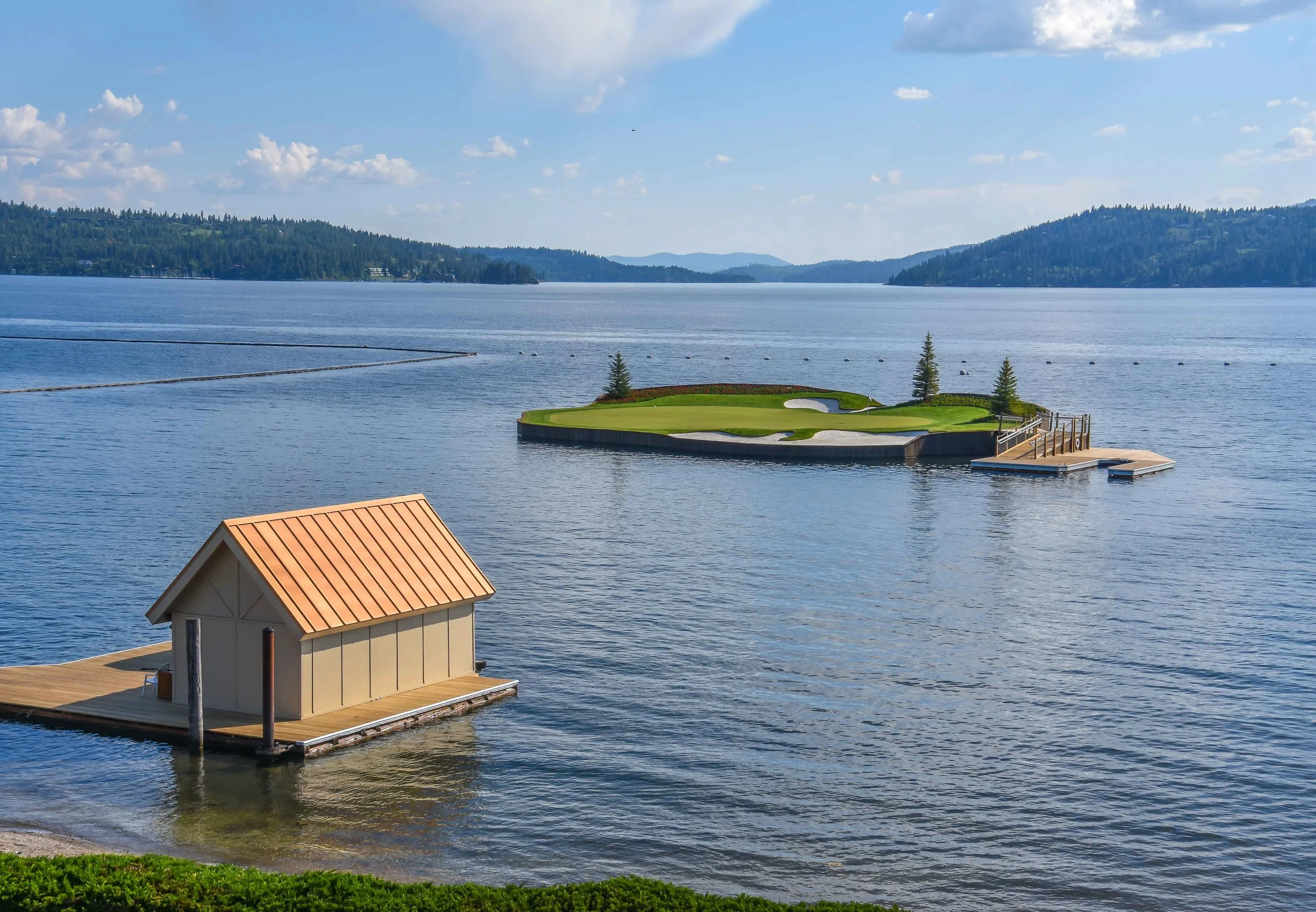 The view of the floating 14th green emerges as soon as you step outside of the clubhouse.
