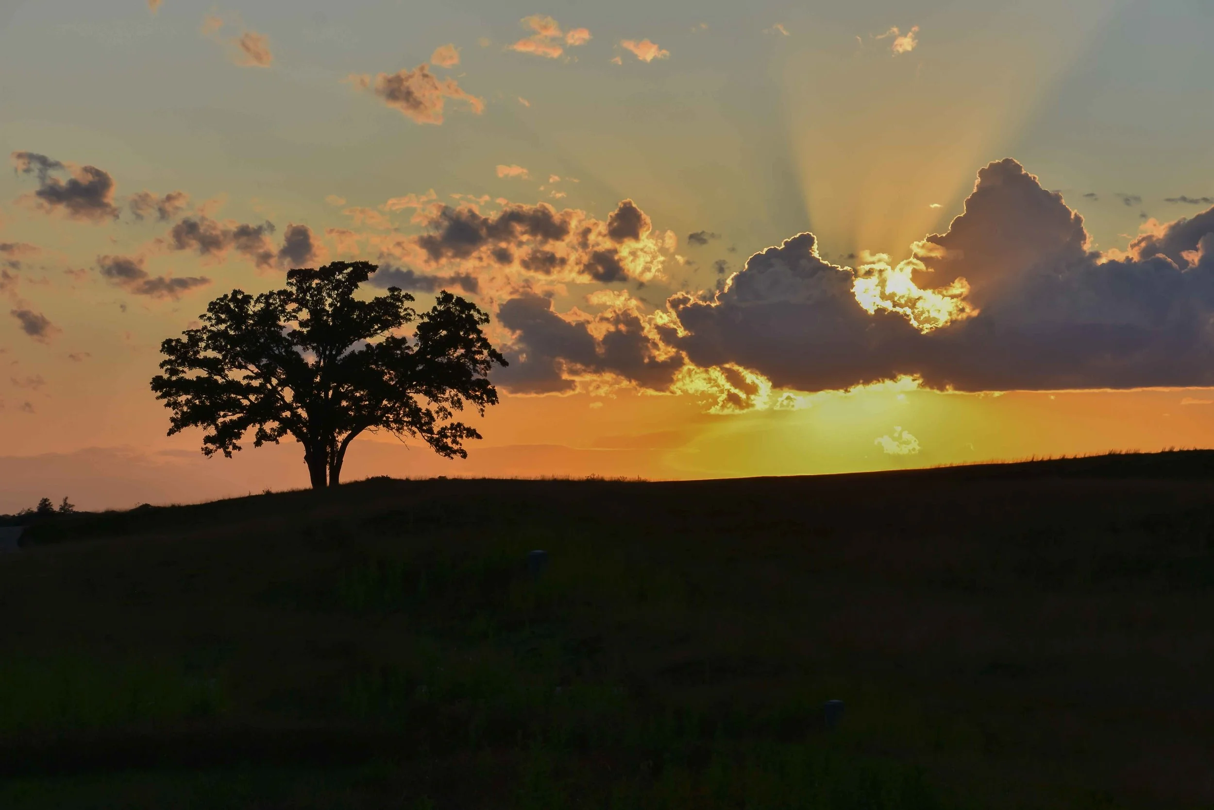 The sun sets over Erin Hills.