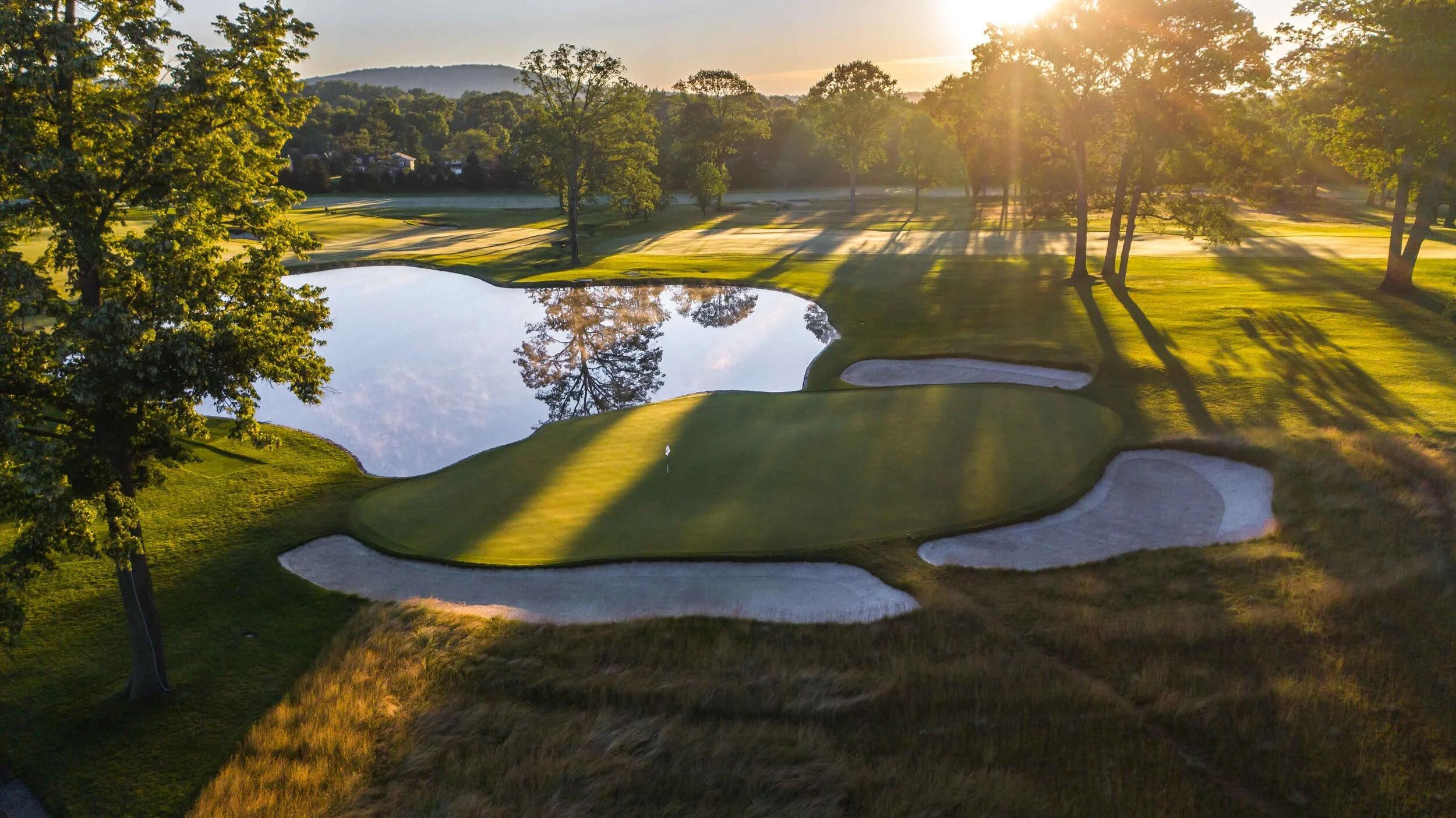 The flowers behind #4 green have been grassed over.