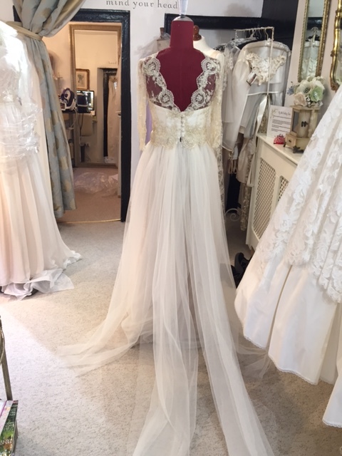 Excited about the extra tulle pieces in the train to add a free, boho feel to the back of the gown. 