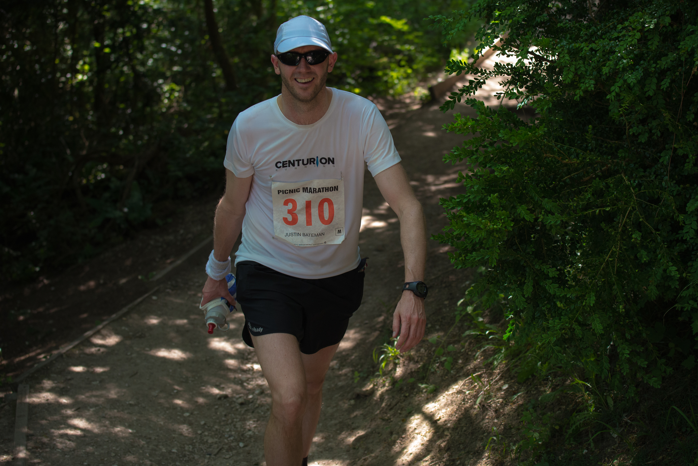 Another smile and with sweatband intact - clearly early on in the race