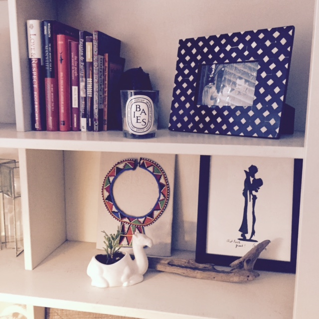  diptyque candle, camel planter , masai necklace from trip to Africa, black and white frame target