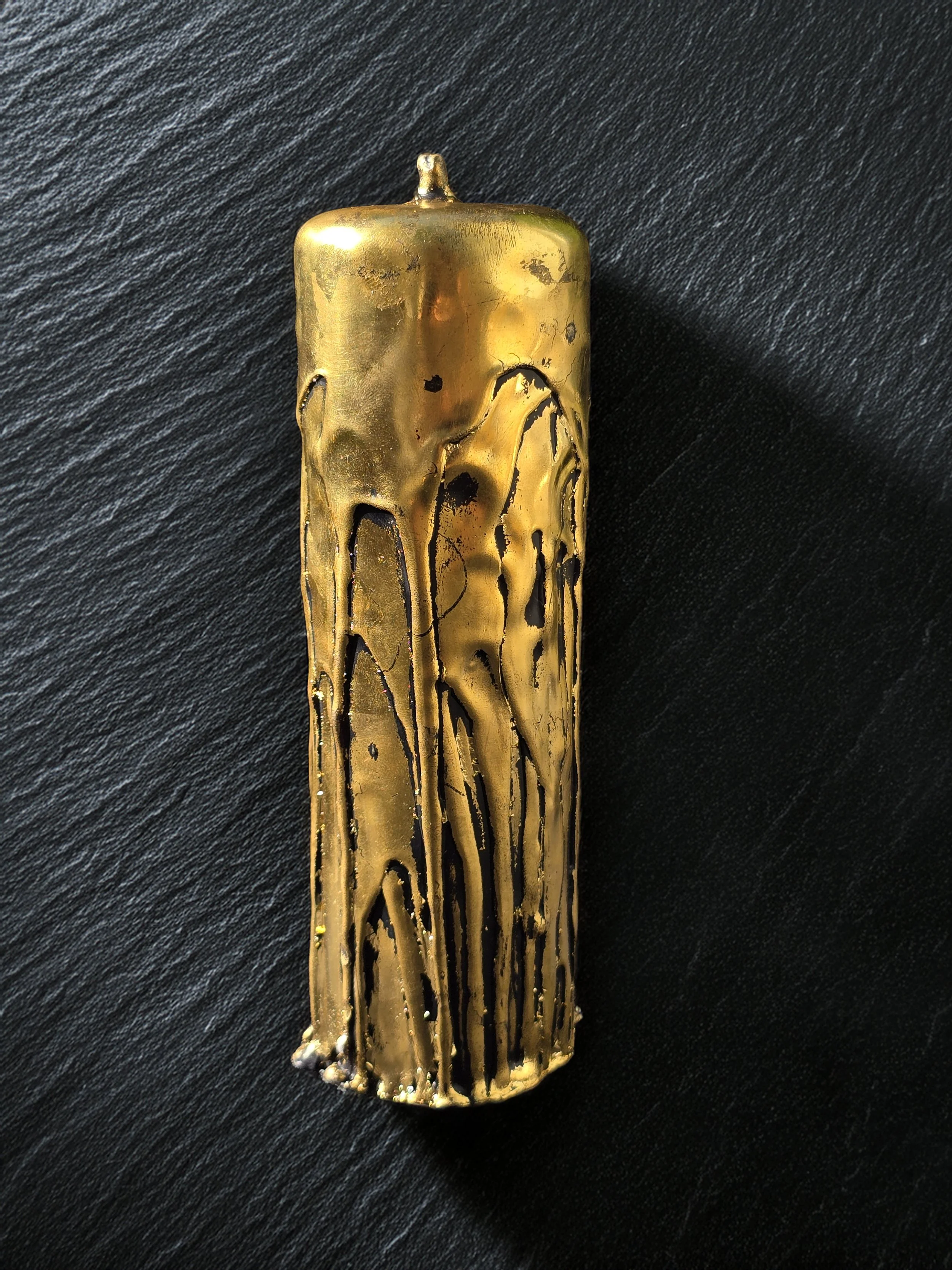 24K Gold and Black wax Pillar on Stone.jpg