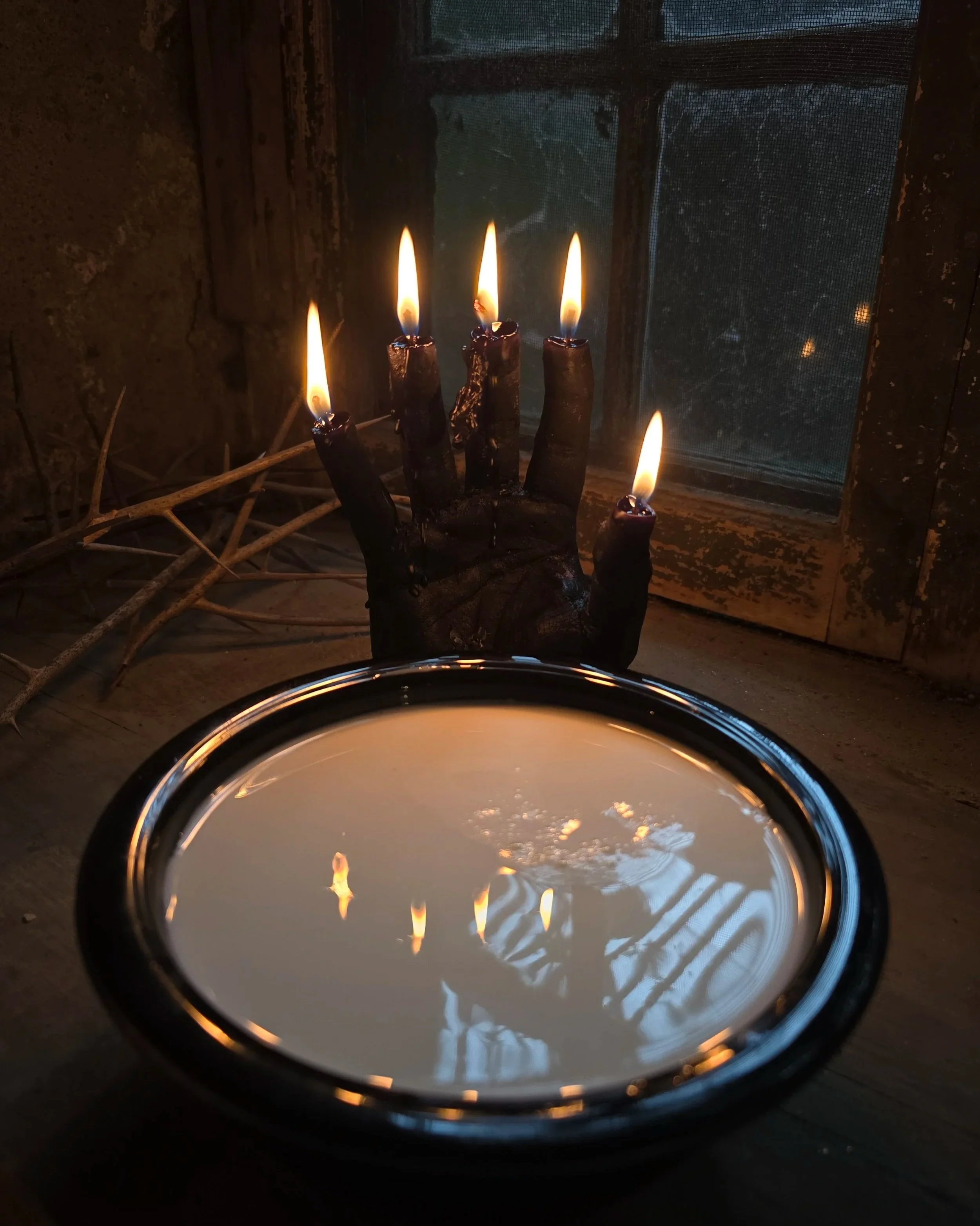 Lit+Hand+of+Glory+with+Milk.jpg
