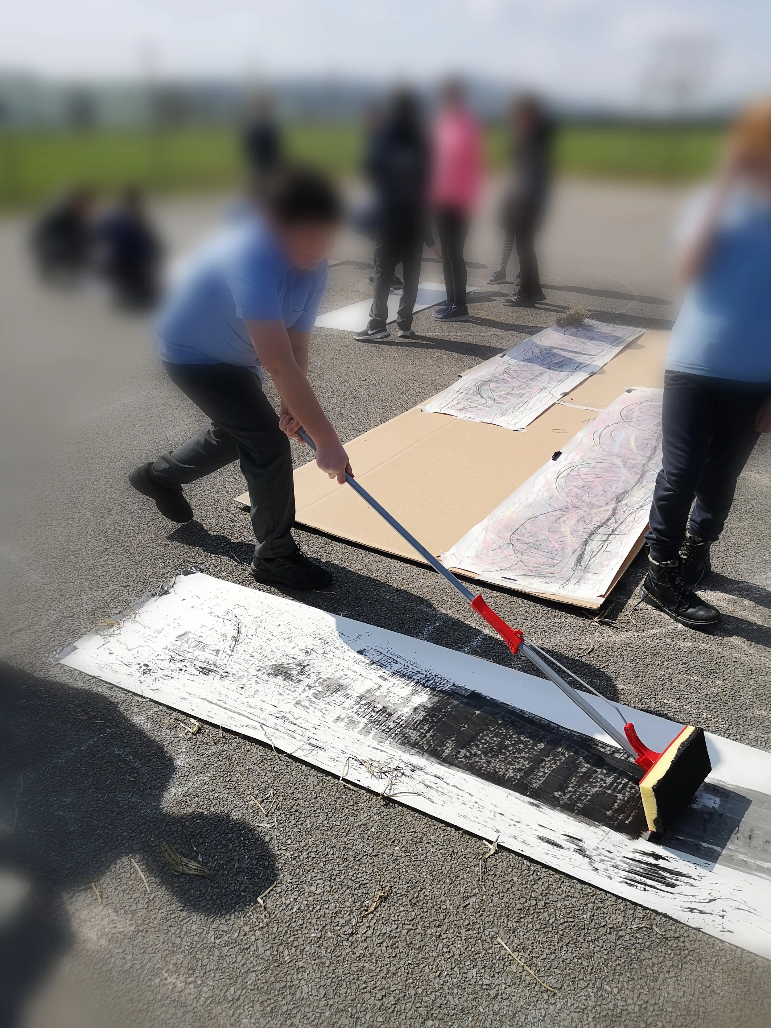 Experimenting with giant Mark making. 6th class.jpg