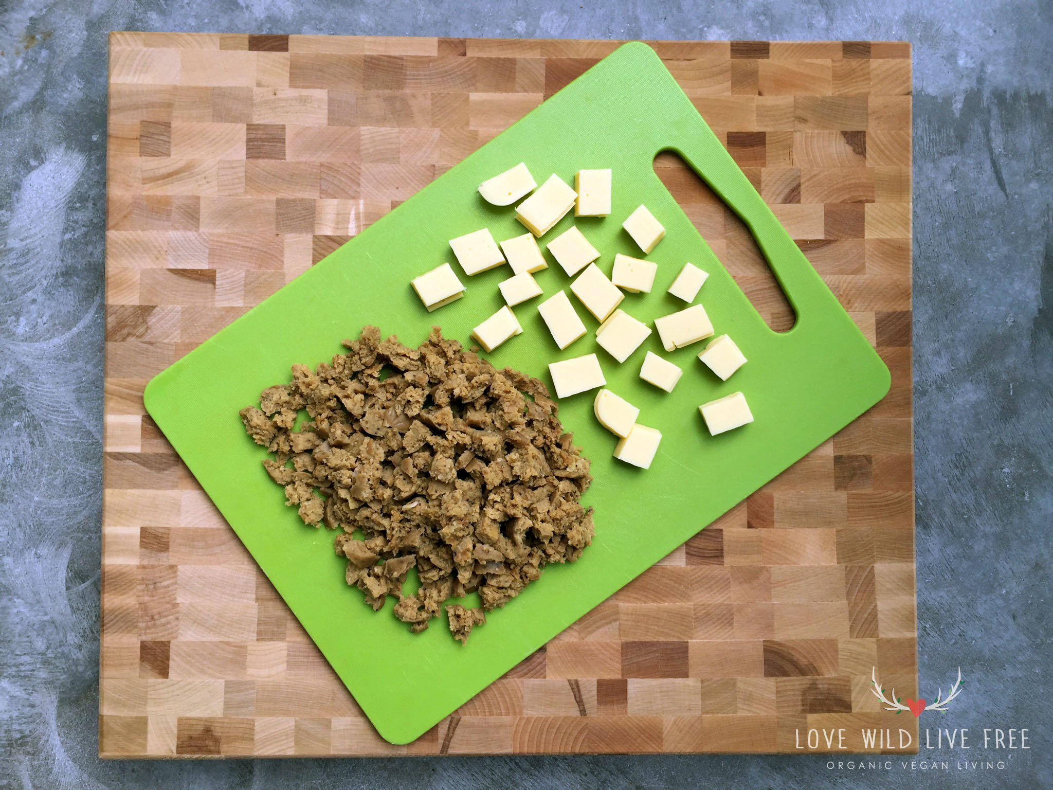 Crumble the Field Roast sausage and keeping the slices stacked together, cut the Chao into cubes to mimic the size of cheese curds.