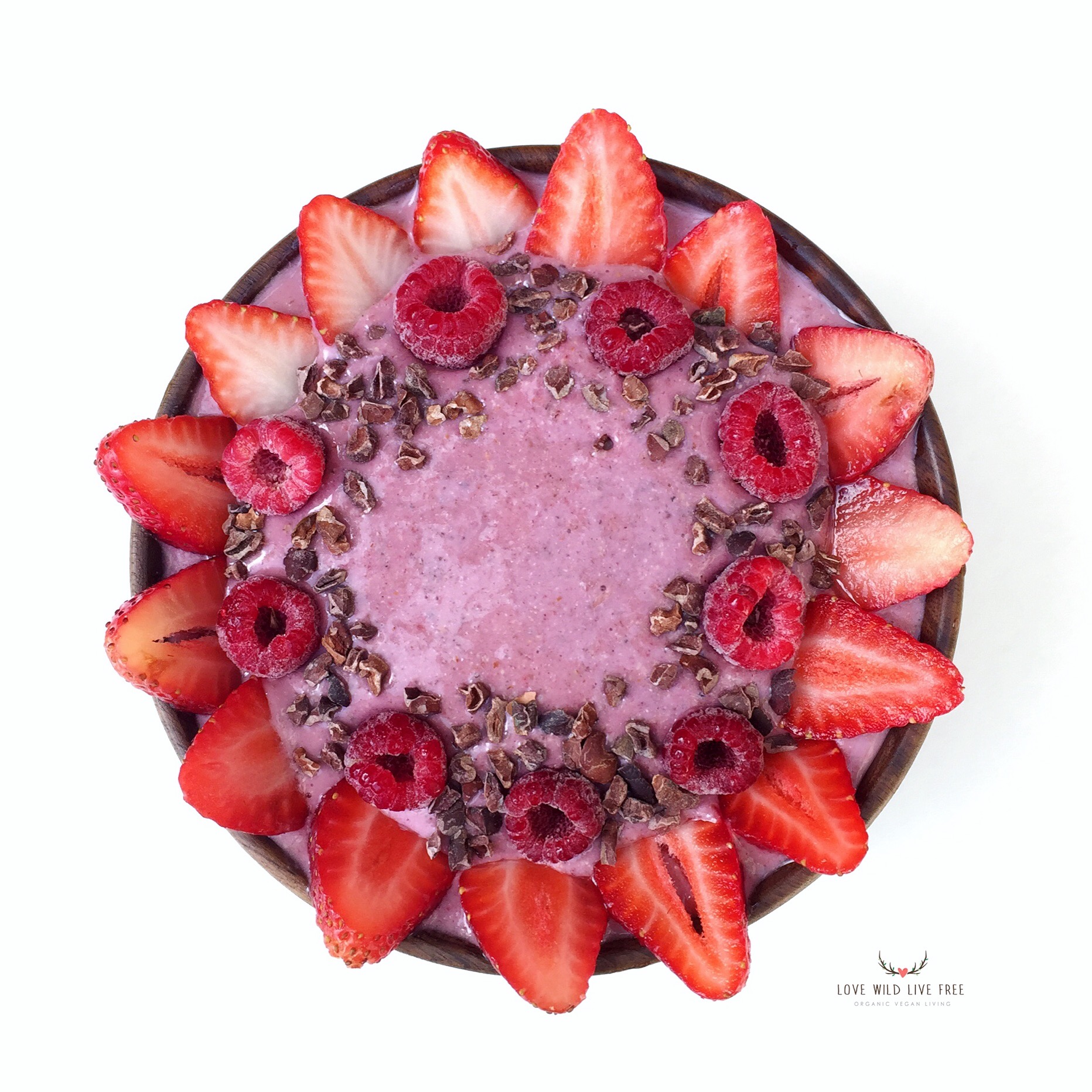 Vegan smoothie bowl made with Manitoba Harvest Hemp hearts, strawberries, cacao nibs, raspberries, bananas, coconut oil, filtered water, chia and organic seeds. To get your hands on yummy, nutty hemp hearts check out Manitoba Harvest Hemp Foods and get 10% off using the promo code “Hemptastic” at checkout. Click here . Photo by www.lovewildlivefree.com. 