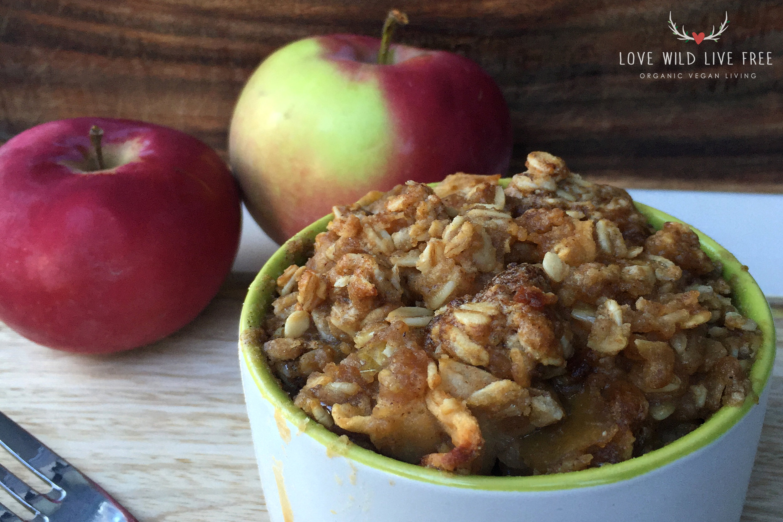 This vegan apple crisp is made with a delicious cinnamon & sugar oat topping. Serve it warm with dairy-free ice cream for the ultimate (guilt-free) indulgence. Photo by Love Wild Live Free.