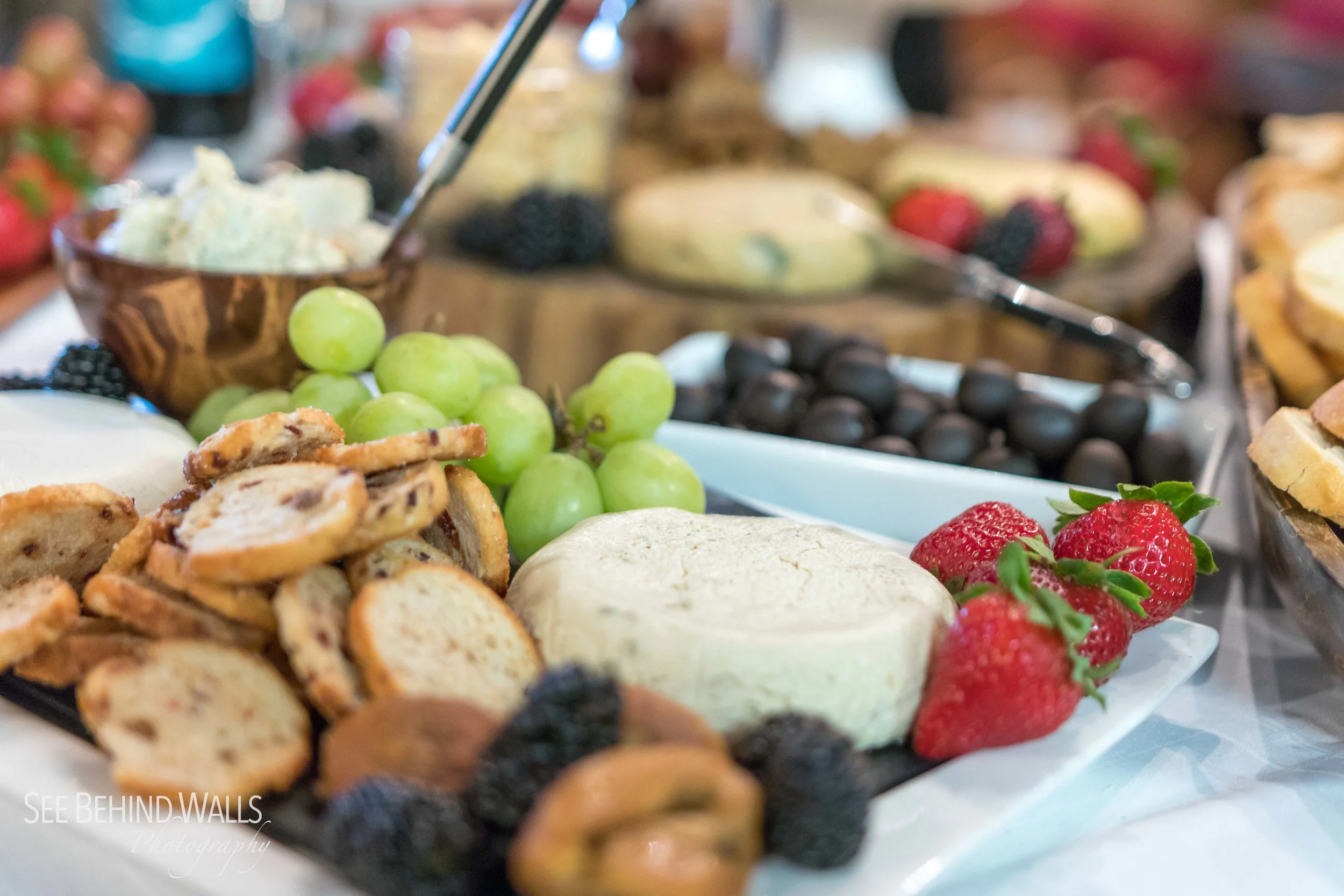 A selection of raw vegan artisanal cashew cheeses by Zengarry . Photo by Alex Bez, See Behind Walls Photography .