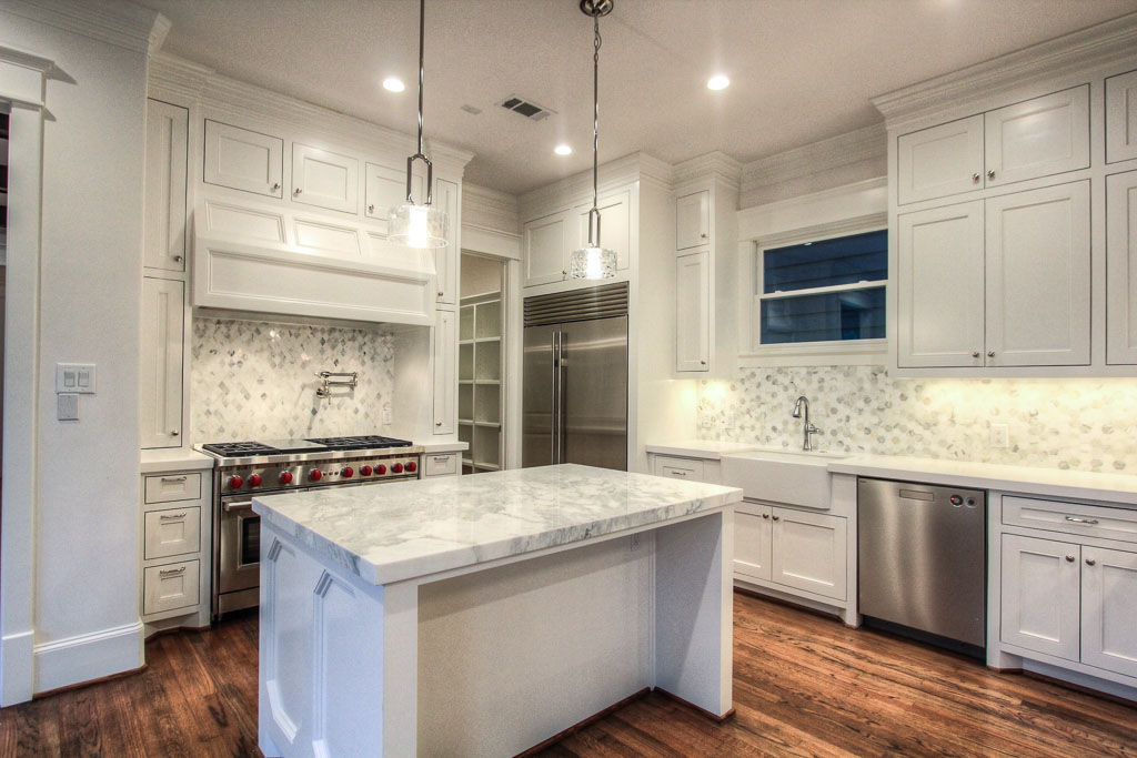 Generous Carrara & Calacatta Gold marble selections in the kitchen, with equally abundant counter space from the island and an extended counter overlooking the great room. Perfect for entertaining.