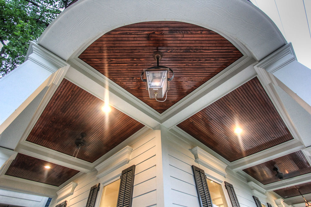 The beautiful wraparound porches on both first and second floors have an wide open view of the Heights Hike & Bike Trail and ample lighting and ceiling fans.
