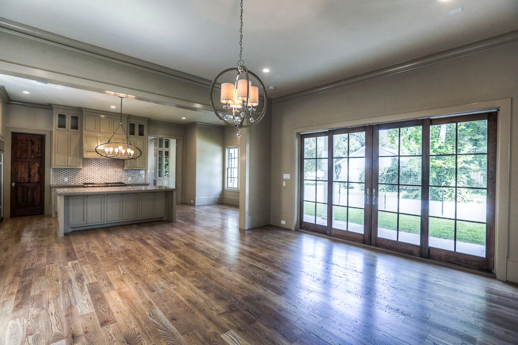 The great room is open to the kitchen and breakfast nook, and it has sliding french doors to the front yard. This living area is a warm space for the entire family to gather day in, day out. Pre-wired for a sound system and Smart Home features.
