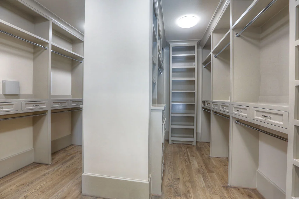More of the extensive built-ins in the supremely well designed master walk-in.