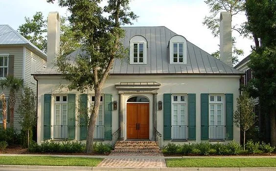 One of the Ken Tate Creole Cottages that has inspired 712 E. 9th.