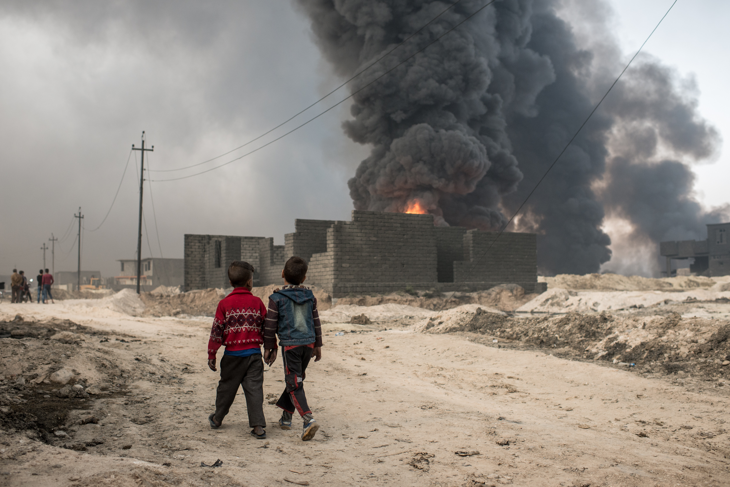 As Iraqi forces bore down on Mosul, the jihadi group set oil wells ablaze in Qayarrah, blanketing the city in ash. Read the report here .