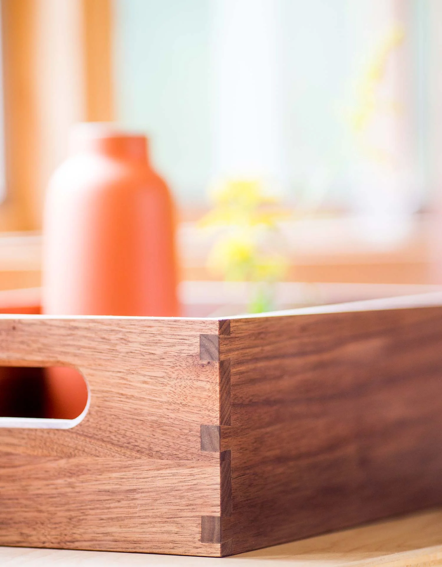 Unique dovetail pattern and solid wood raised panel bottom are features elevating the Market Box to something more like a piece of fine furniture.
