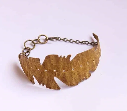 ss13 wrist feather hard tan.jpg