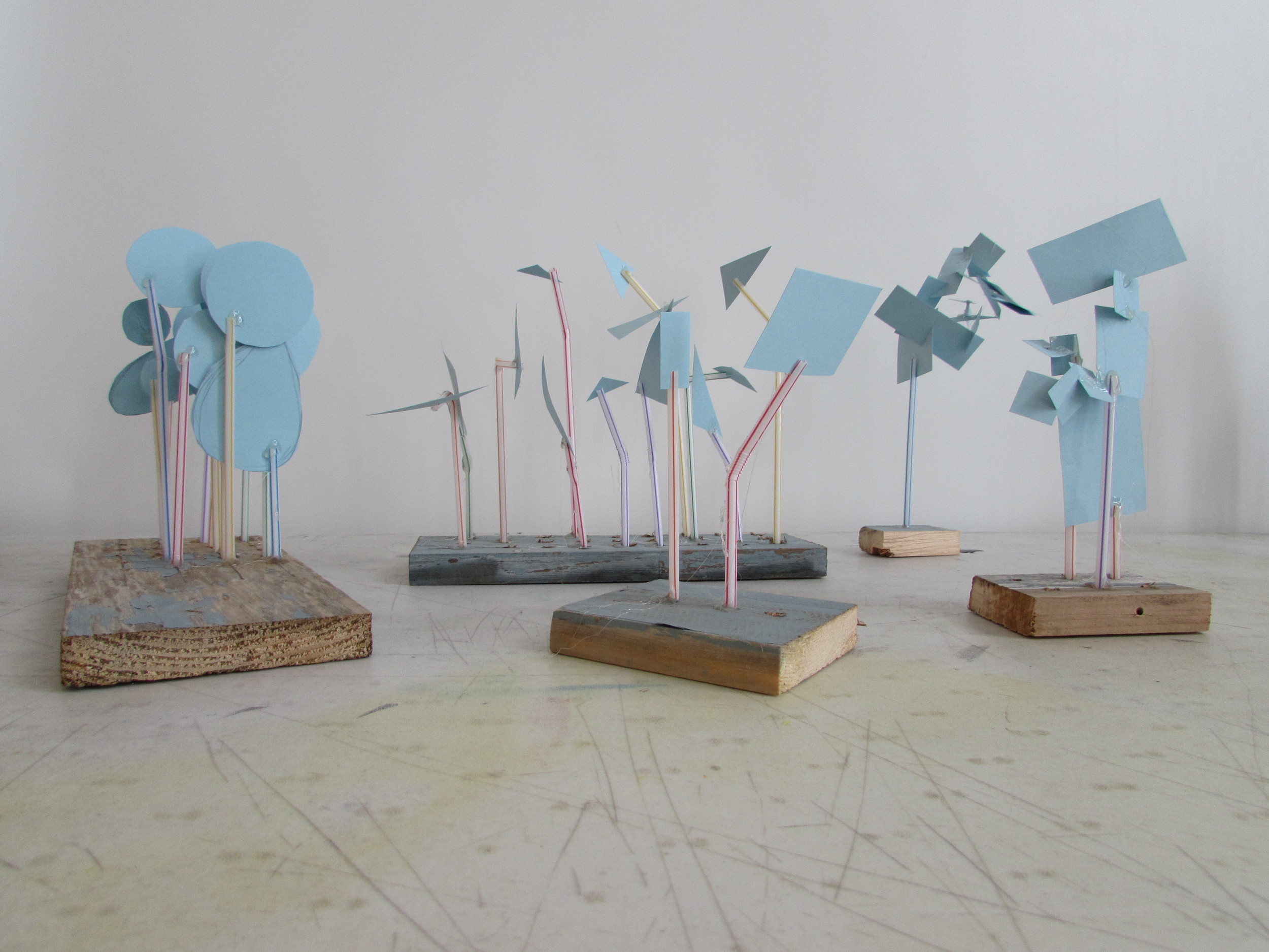Justin Desper's figurative sketches rely on a smart and frankly delightful palette: powder blue paper, dixie straws, hot glue and scrap wood.