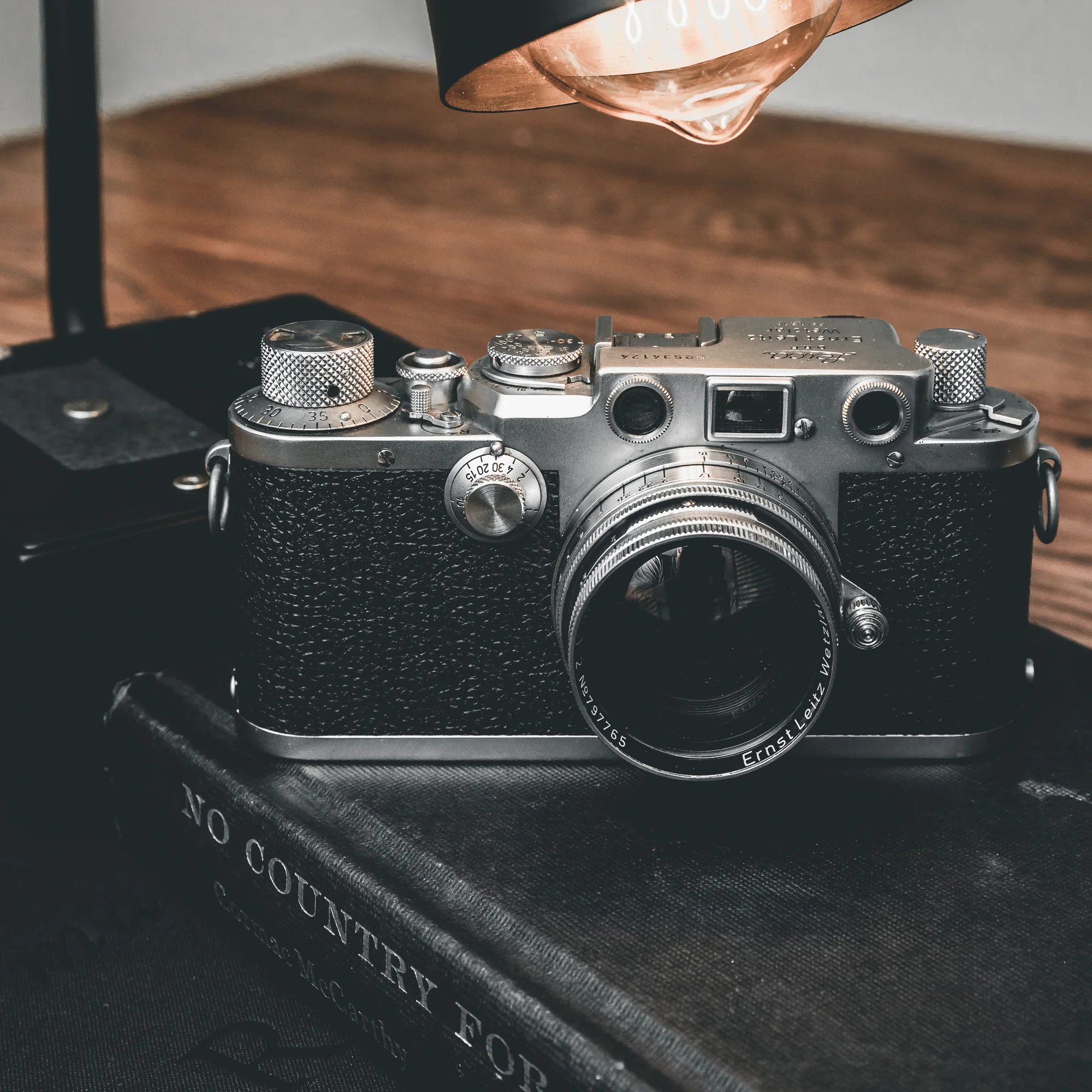 When I first fell in love with photography in the early 90's it was while shooting on film and developing in a darkroom. I haven't shot on film since 1998 so I was pretty excited to find this gorgeous 1950 Leica IIIf on craigslist a few weeks ago. I popped my first roll of Ilford 400 B&W this morning and downloaded a light meter for my phone. Looking forward to seeing my first 36 exposures... and hopefully they aren't a bunch of under and over-exposed disasters. I'll be posting some of the images here in the next few weeks assuming they aren't. On a side note I find it pretty funny how after every shot I've taken so far on this camera I chimp the back only to be staring at black leather.