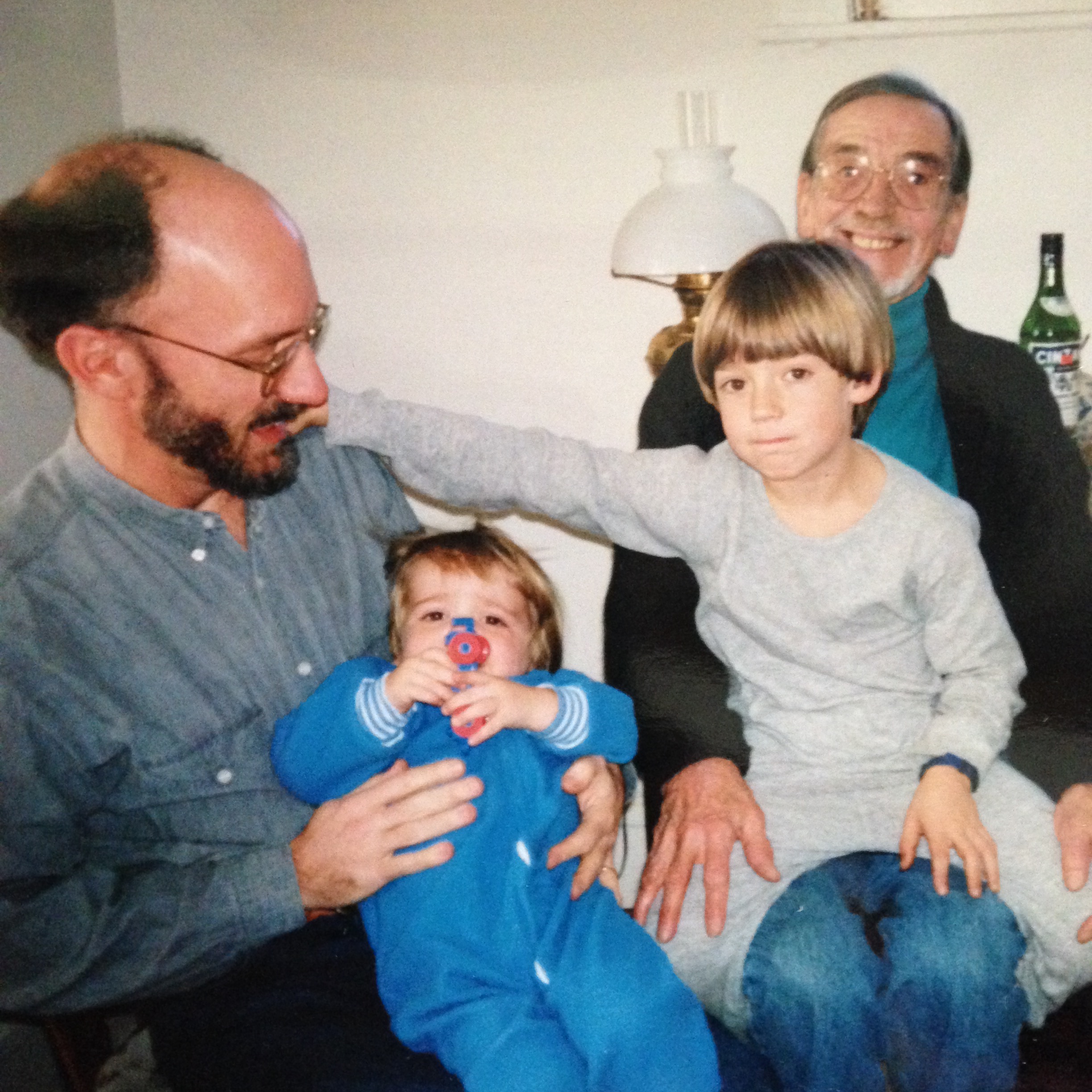 My father wearing the cardigan Christmas morning 1997