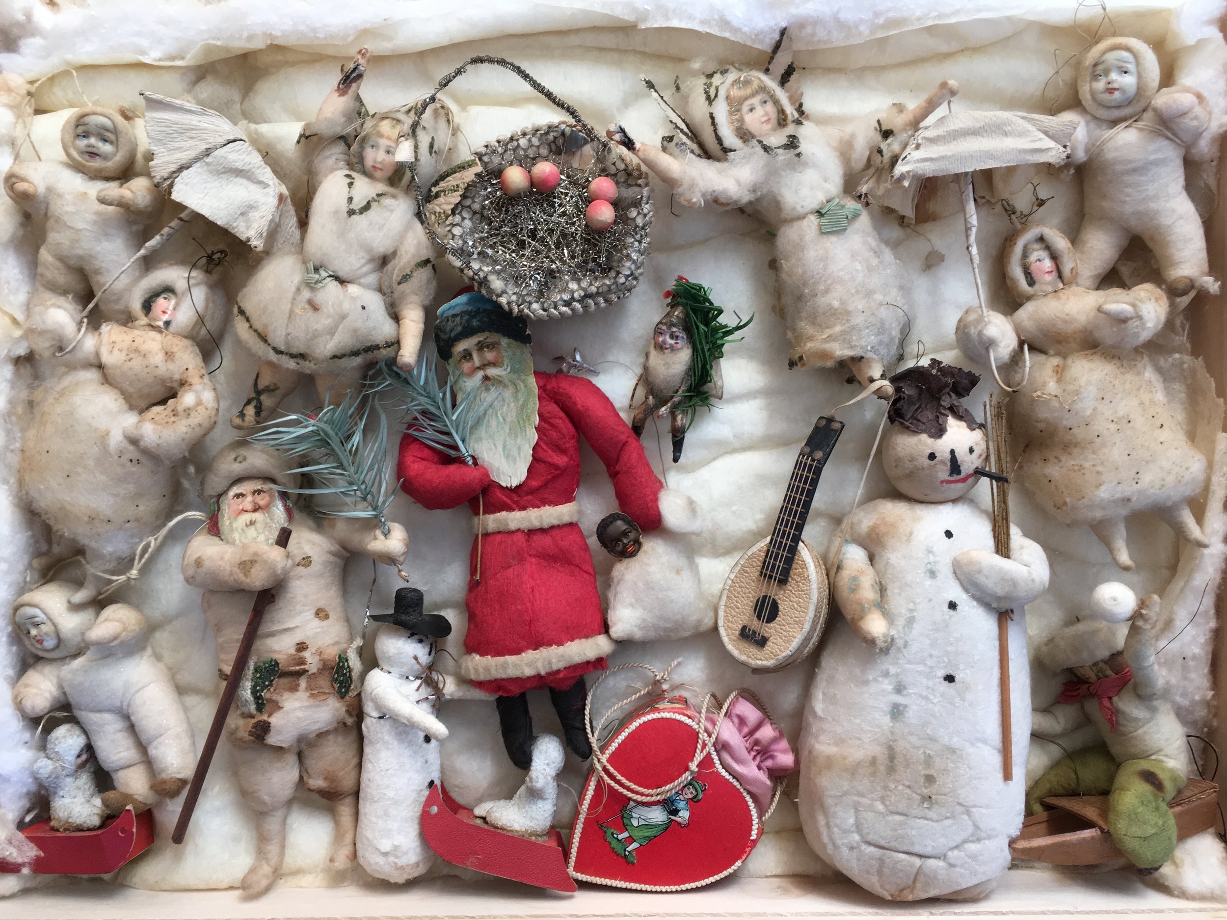 Antique ornaments in a shadow box