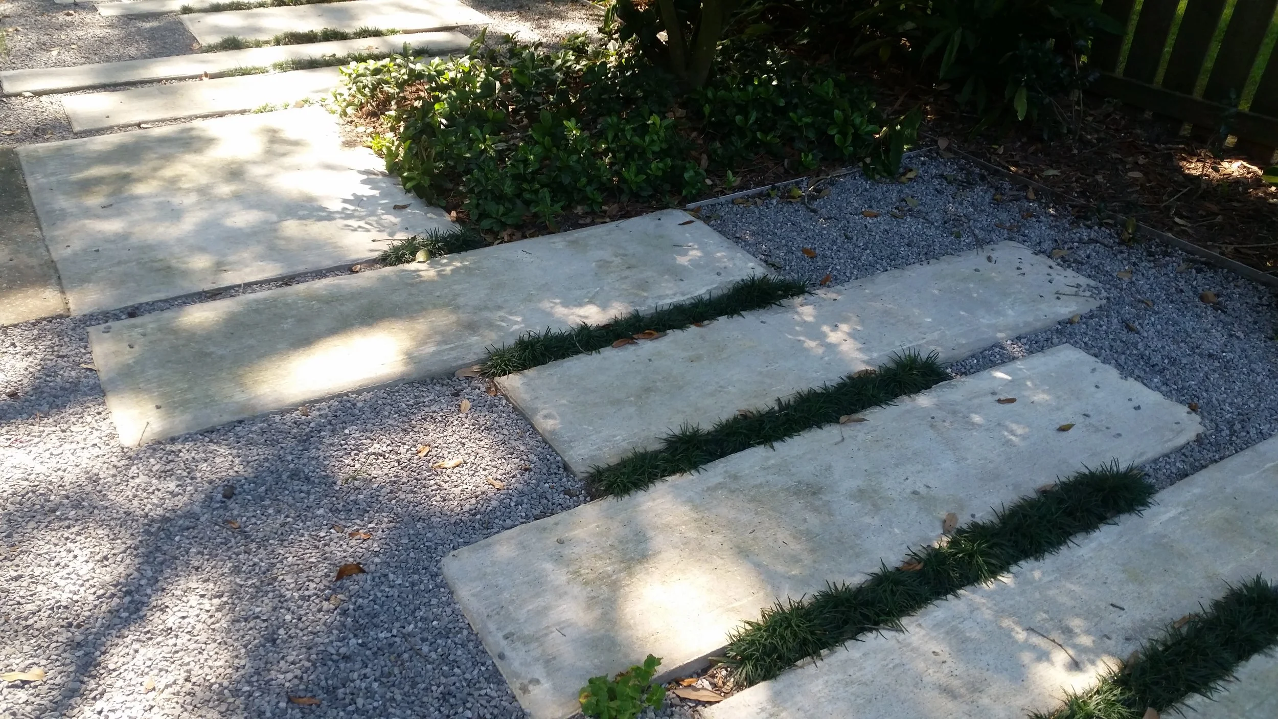 the front entry shows paver and walkable groundcover details