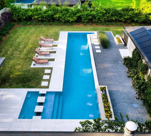 The sunshine after all that rain has us ready for a few laps, how about you? 📸 credit @collinrichiephoto 
#landscapearchitecture #residentialdesign #pooldesign #custompool #moderndesign #elslastudio