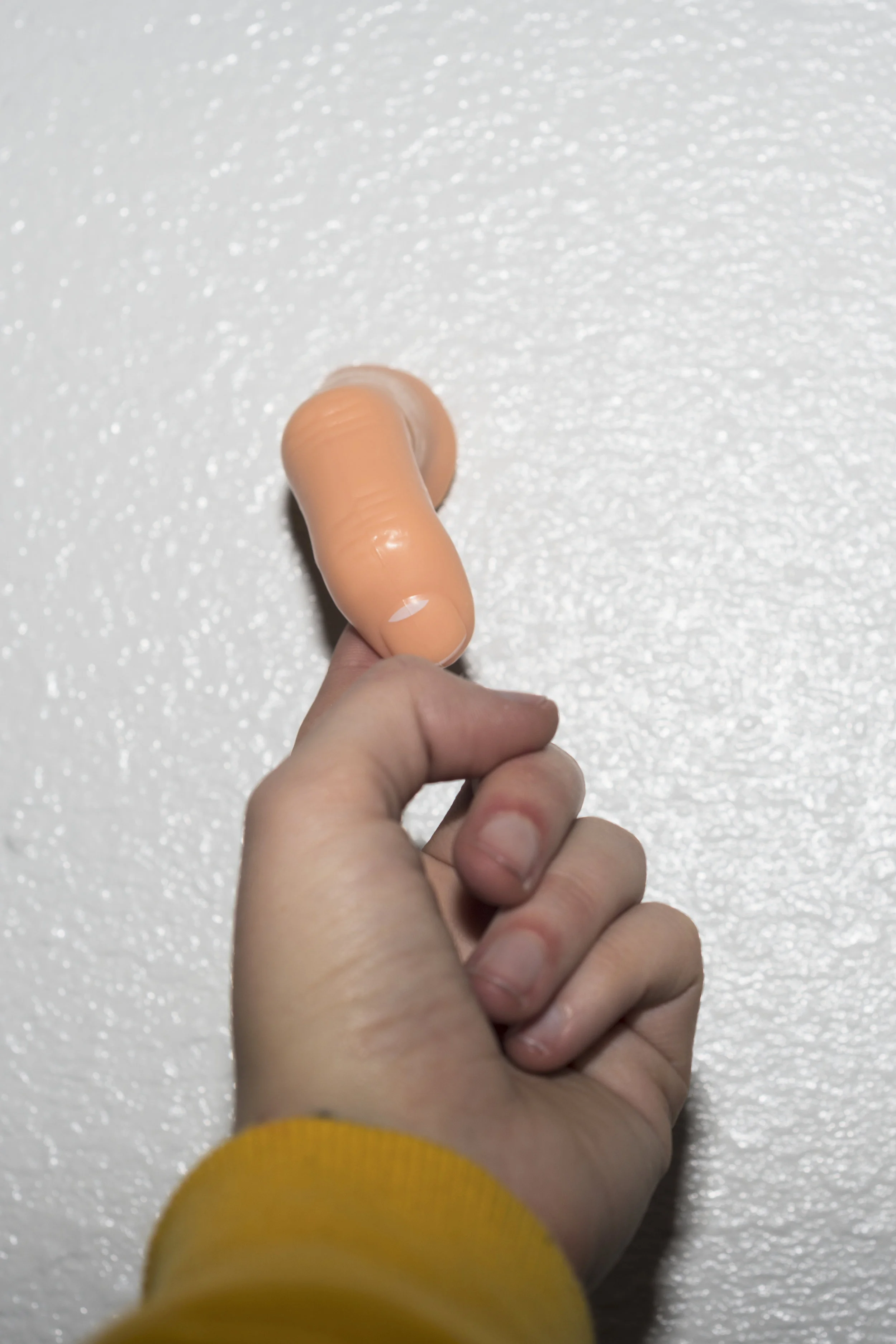 WEBfingeronwall.jpg