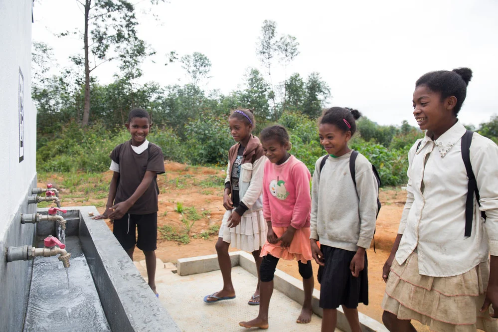Young students know the importance of washing stations and latrines in school.