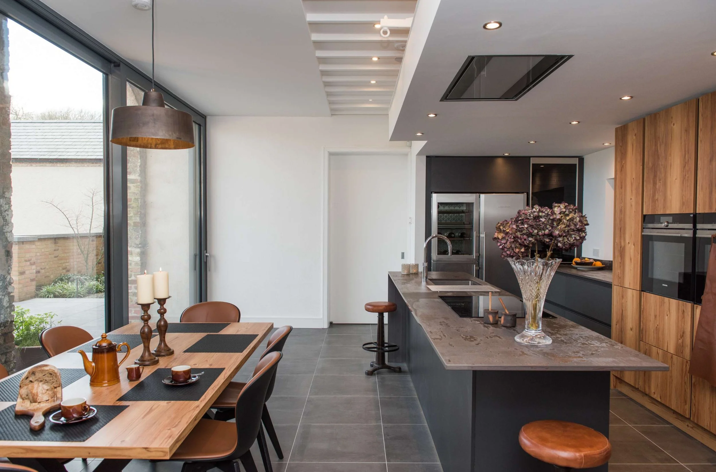 Country coach house showcases organic modernism at its best.