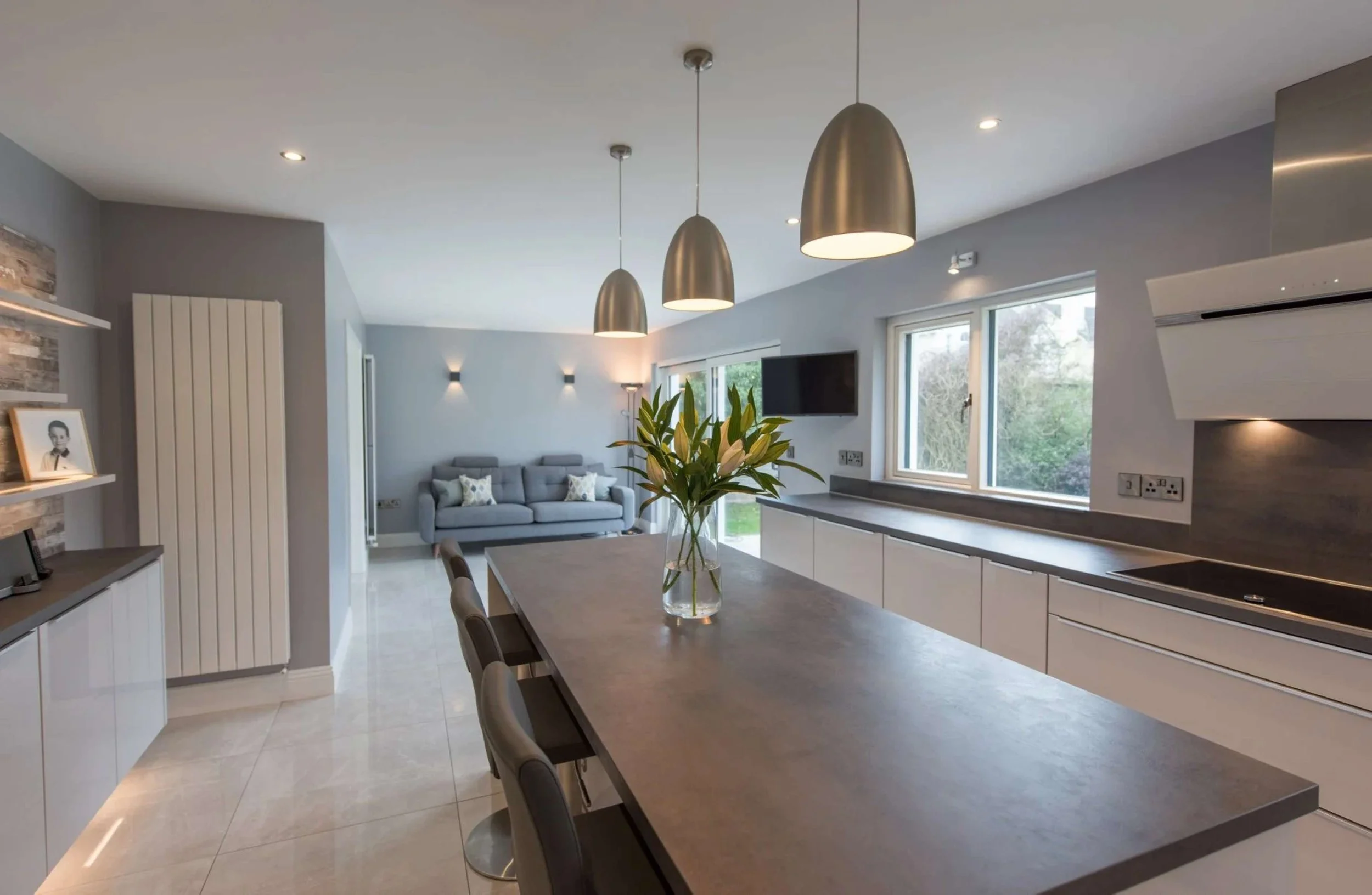 A modern open-plan kitchen and living area is perfect in this busy family home